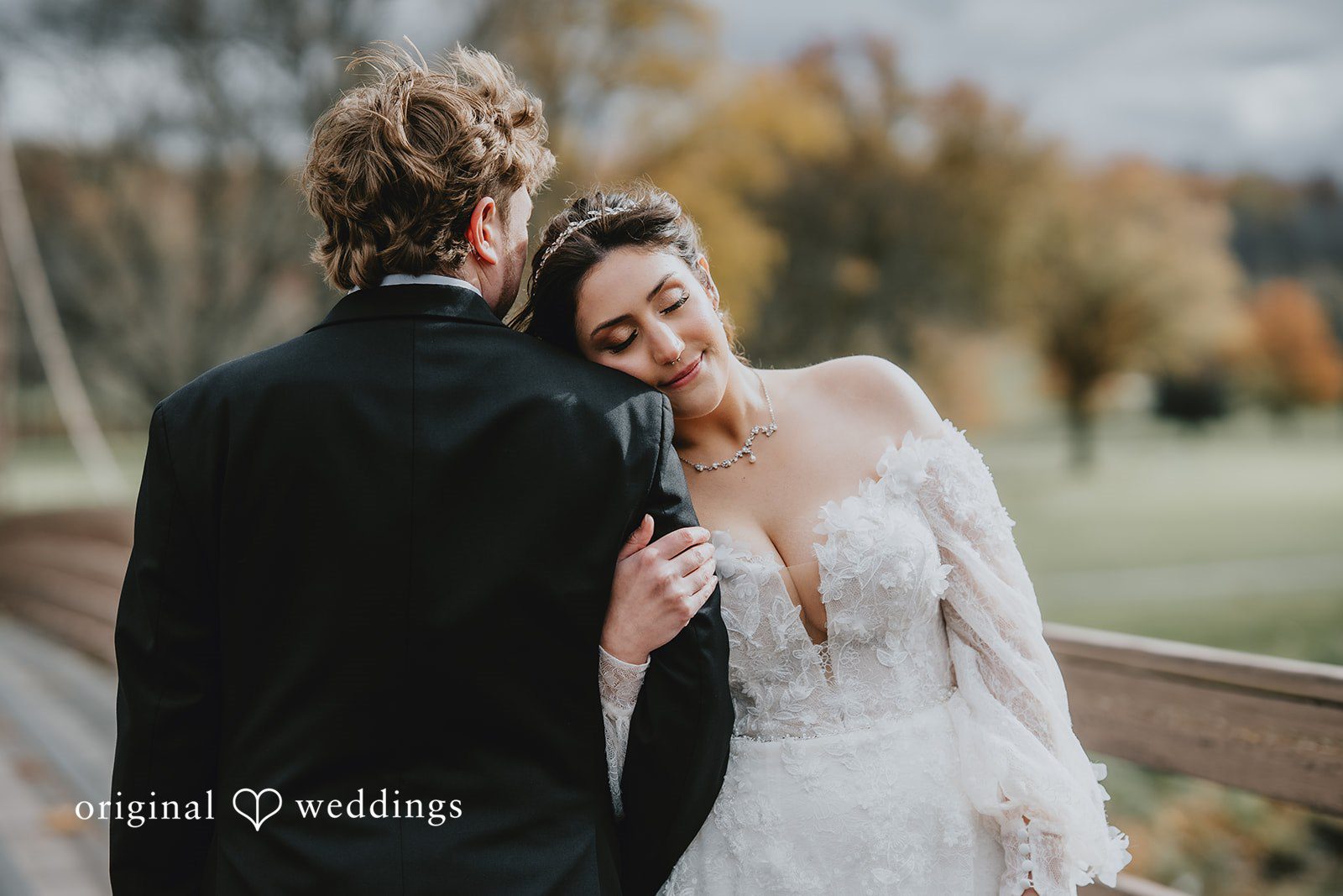 Sweet romantic pose of bride and groom at West Hills Country Club