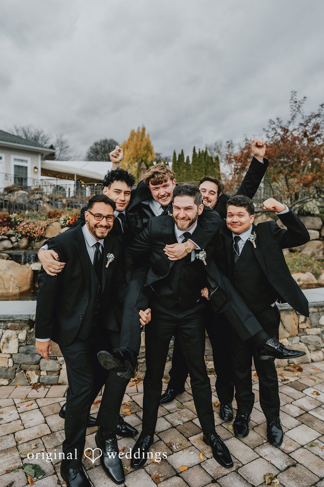 Stylish group shot of groom and friends at West Hills Country Club
