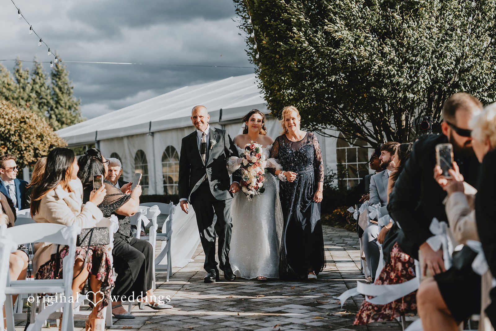 Beautiful bride entering wedding ceremony at West Hills Country Club