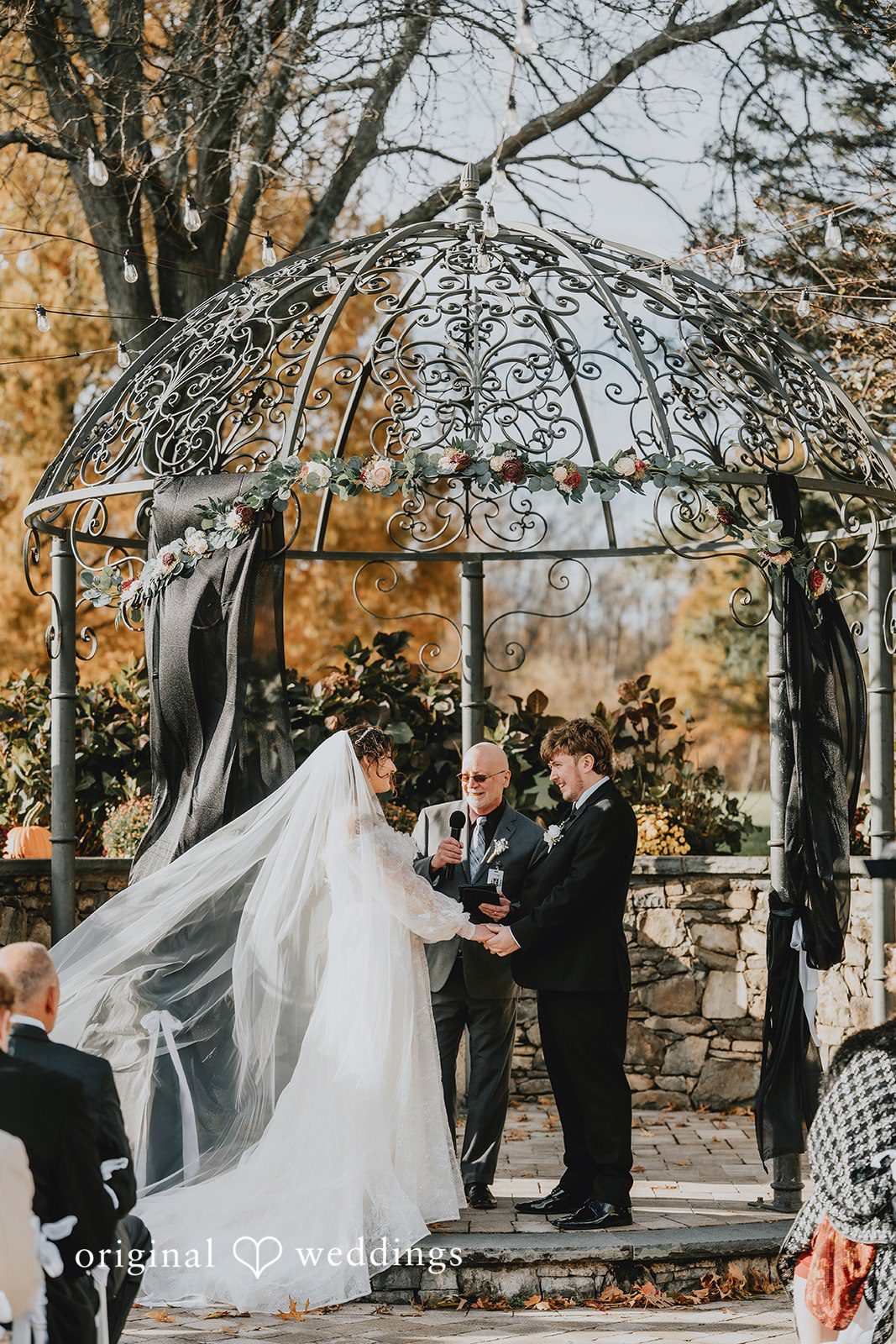 Romantic couple smiling while looking at each other at West Hills Country Club