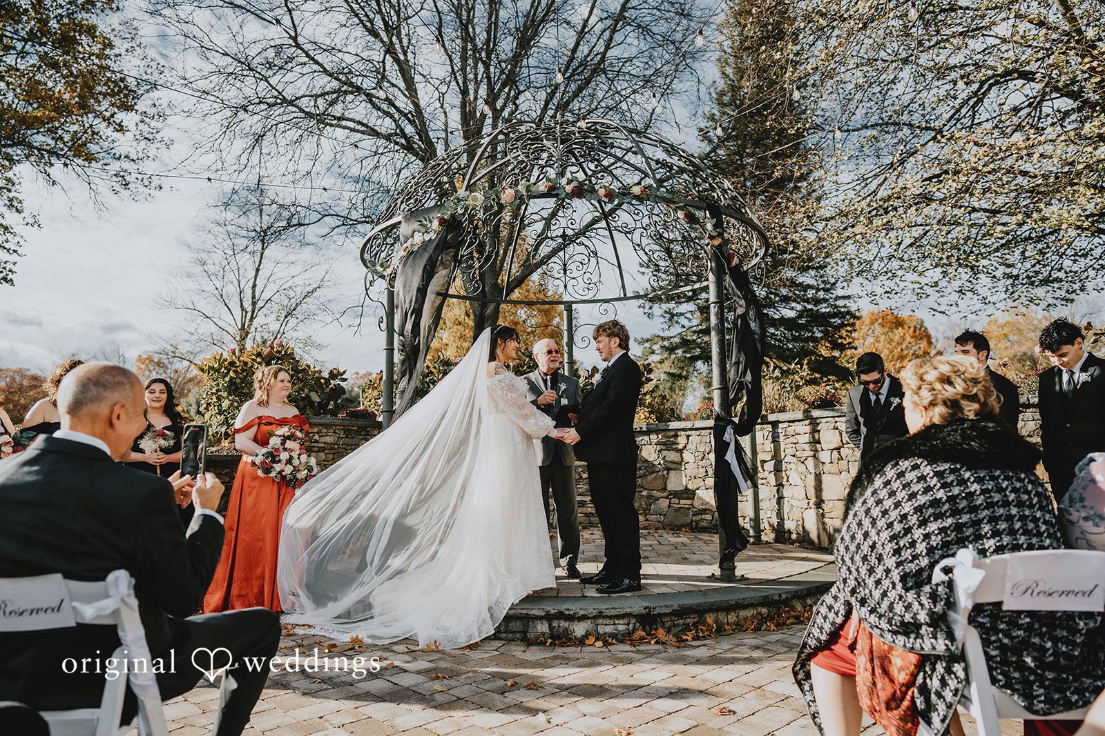 Intimate wedding moment of bride and groom sharing eye contact at West Hills Country Club