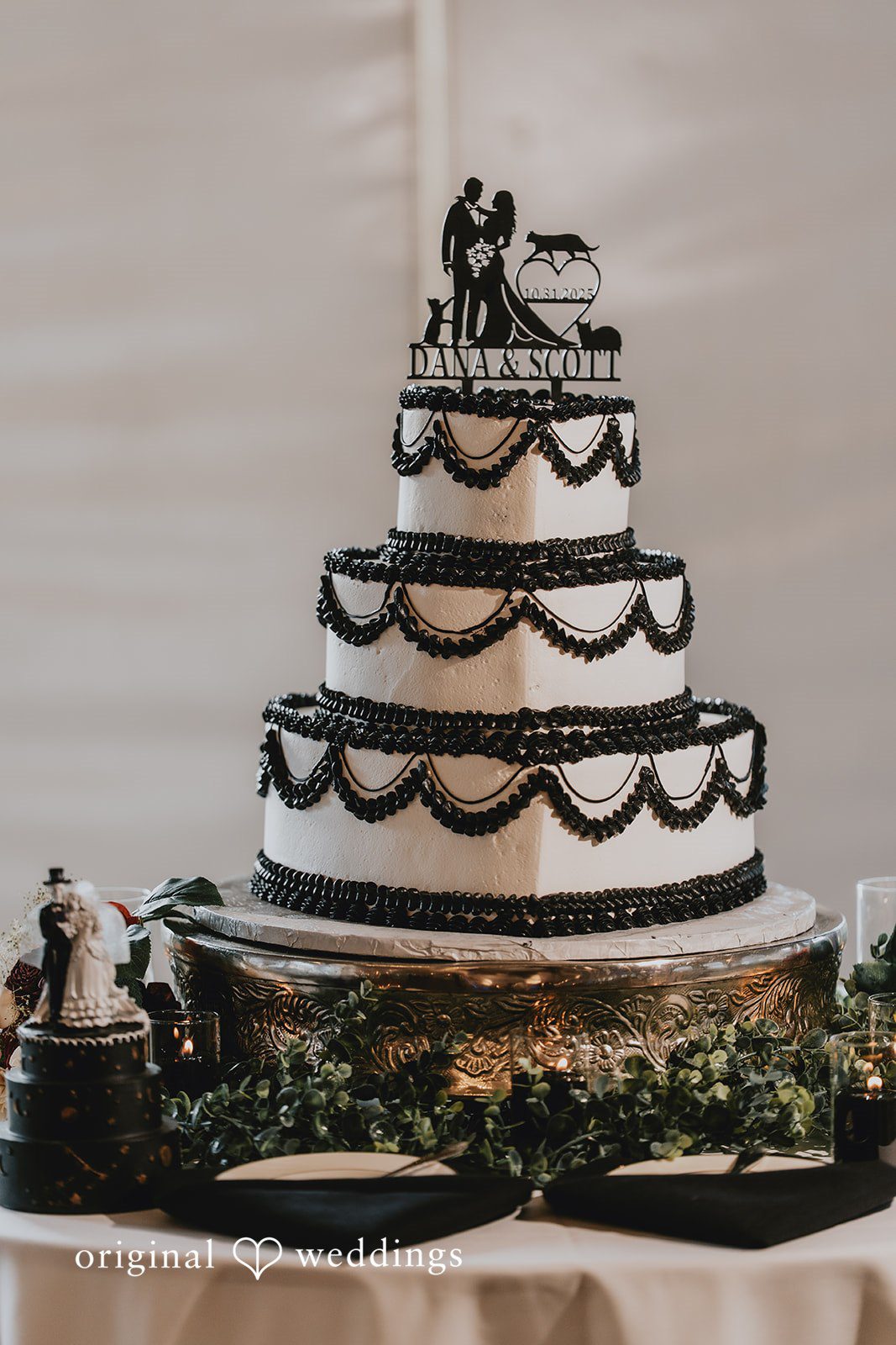 Wedding cake with bride and groom topper at West Hills Country Club