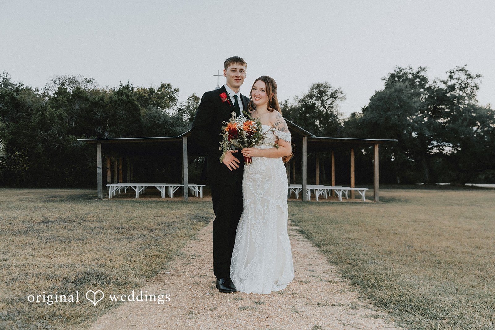 Bride and groom smiling together at Western Sky captured by San Antonio wedding photographers from Original Weddings