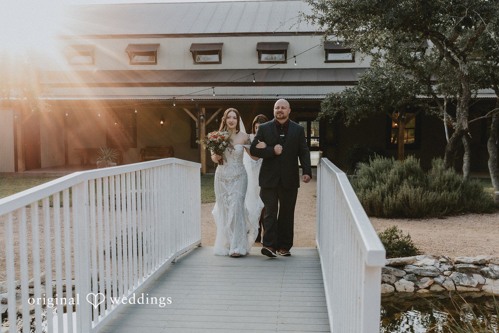 Beautiful bride holding bouquet while walking down ceremony aisle
