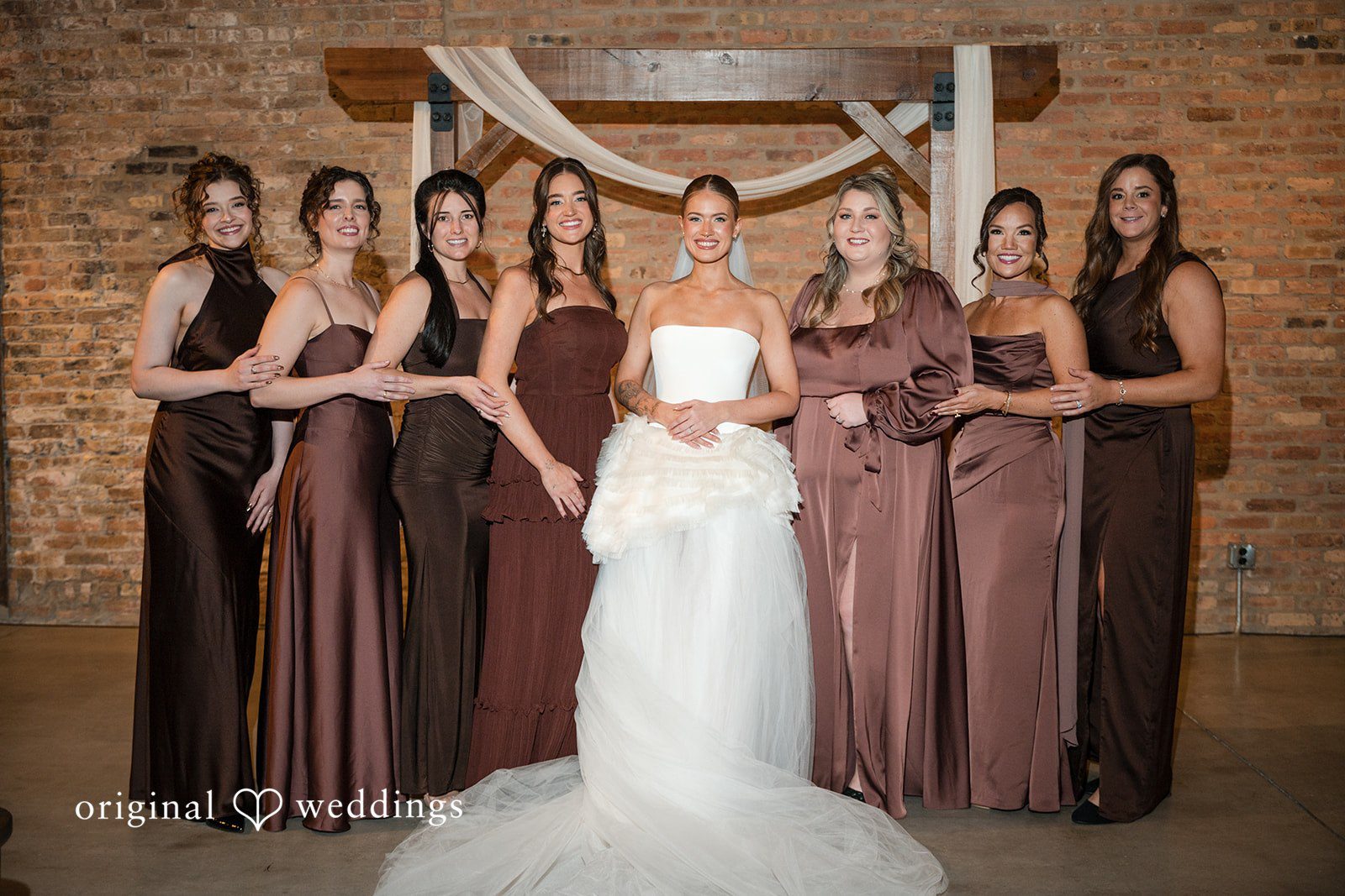 Erin + Zack A portrait of the bride and her bridesmaids
