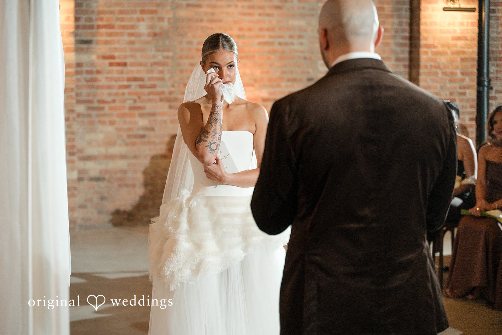 Erin + Zack The bride gets emotional as the groom reads his vows