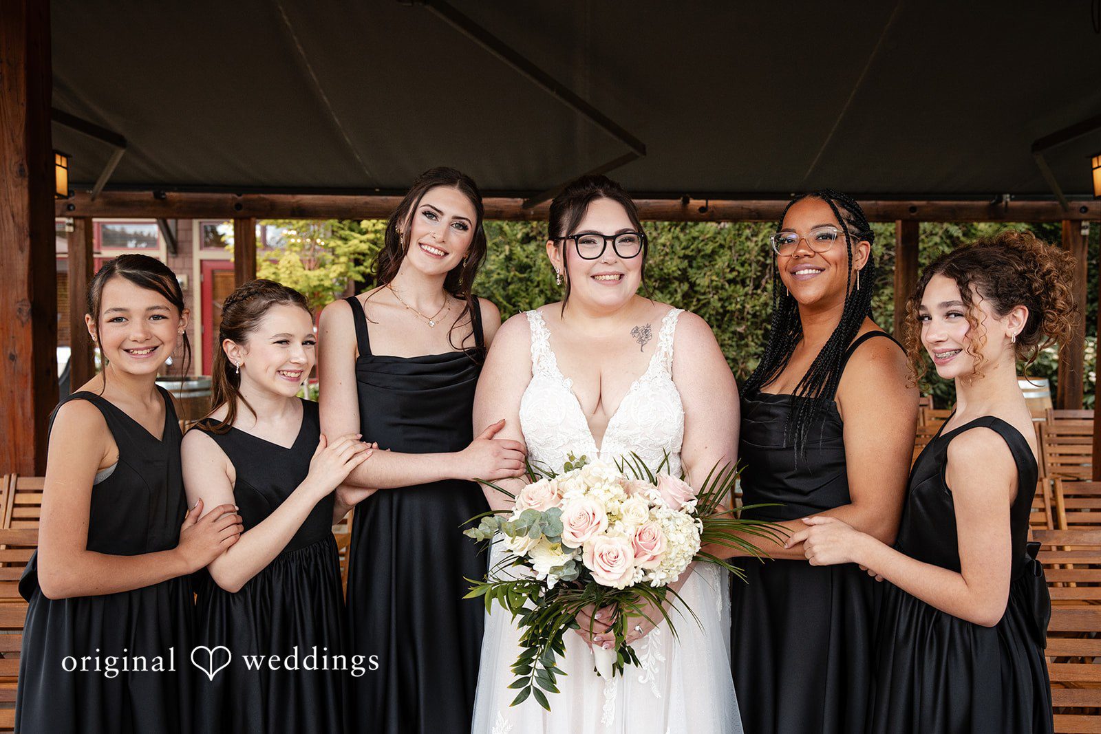 Candid laughter moment with bridesmaids