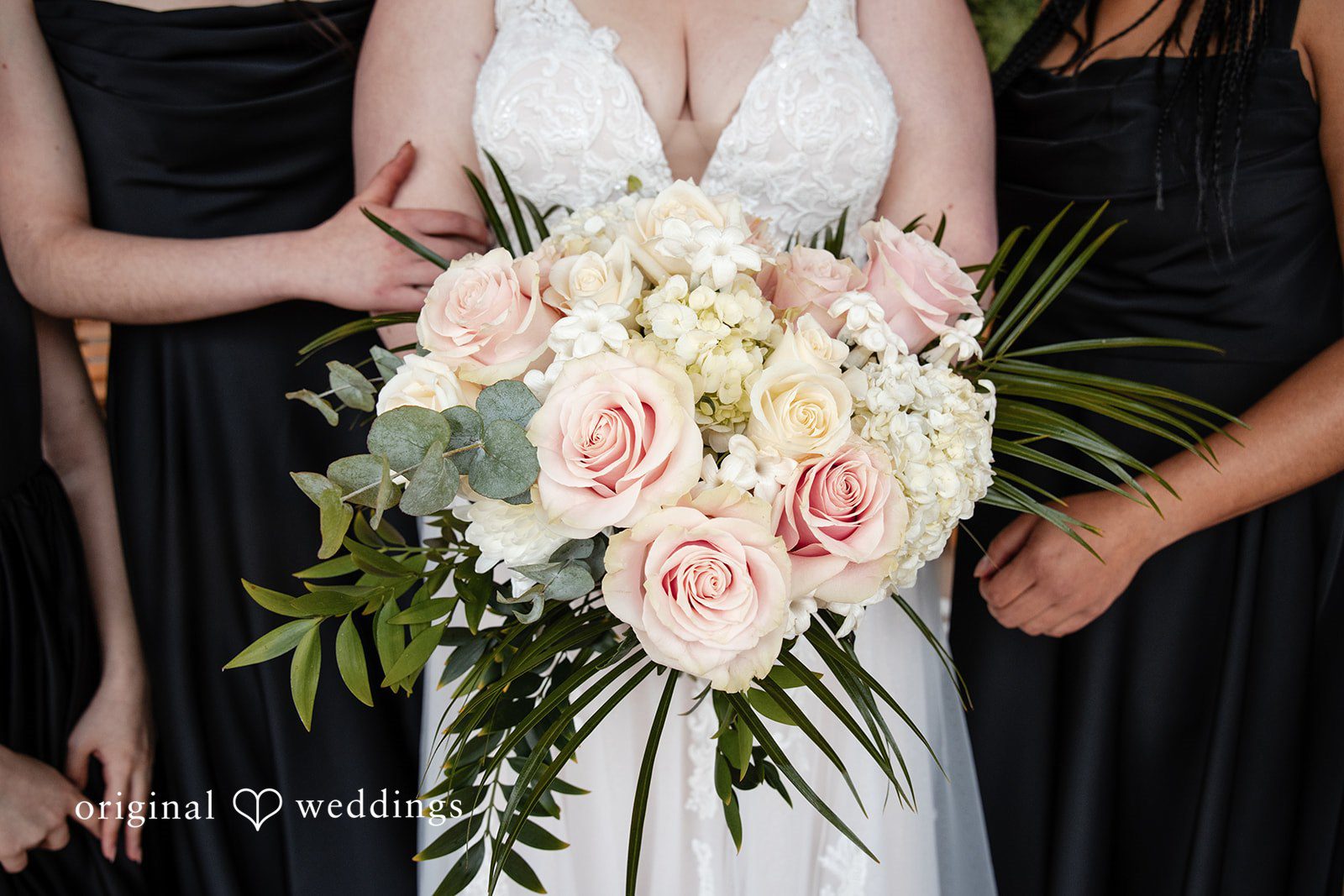 Soft bridal bouquet hand detail captured beautifully