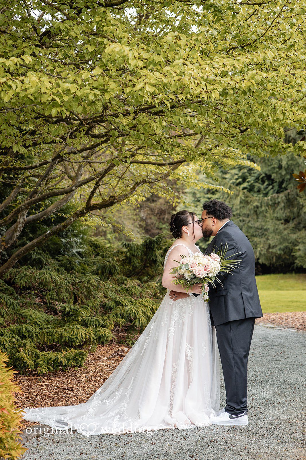 Soft romantic bride and groom connection shot  at Willows Lodge