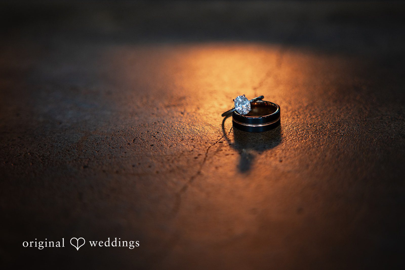 Elegant close-up of bride and groom wedding rings at Willows Lodge