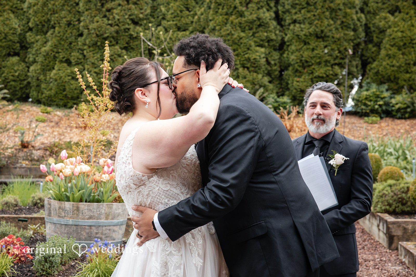 Emotional ceremony kiss shot Willows Lodge