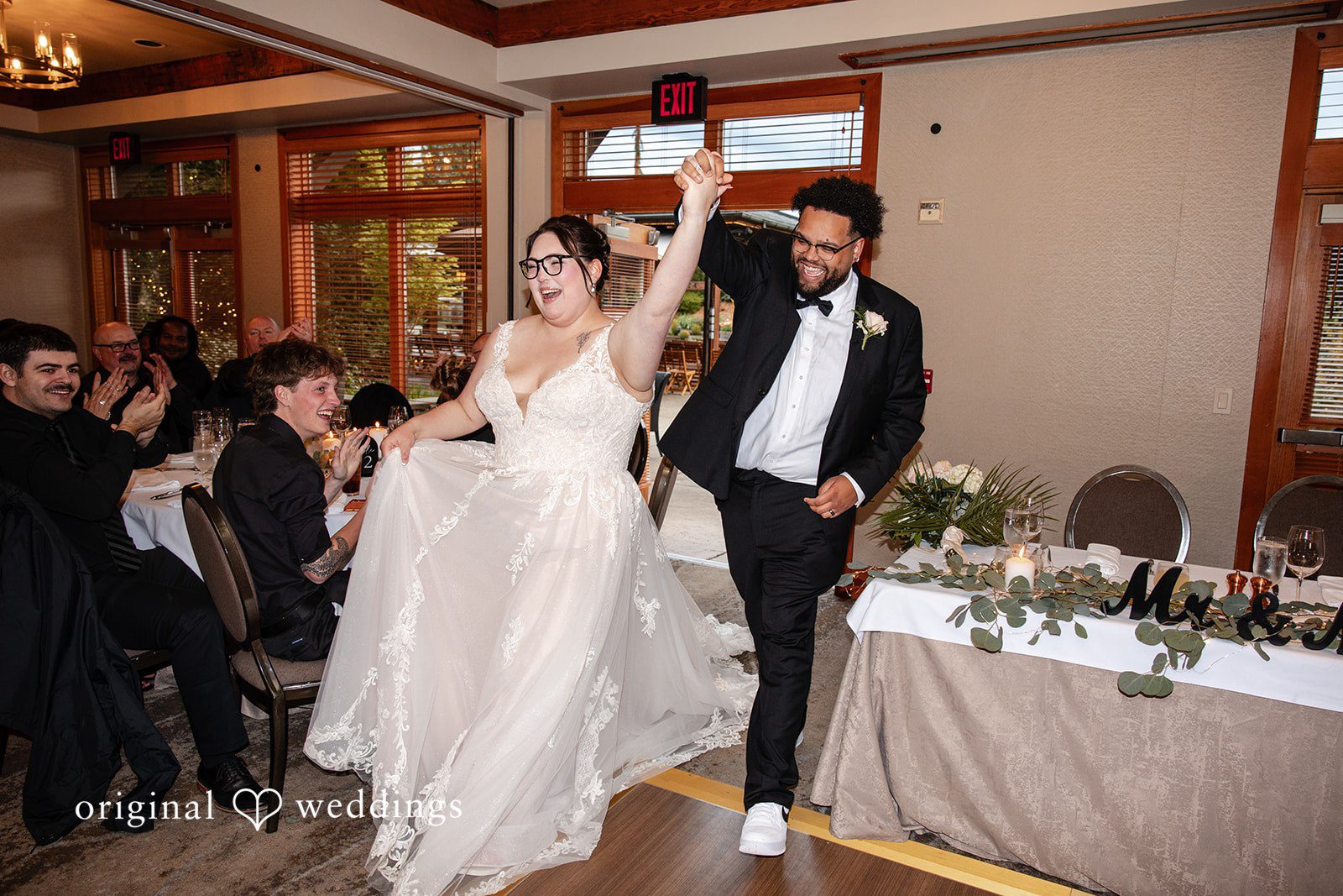 Grand wedding reception entrance moment of couple at Willows Lodge