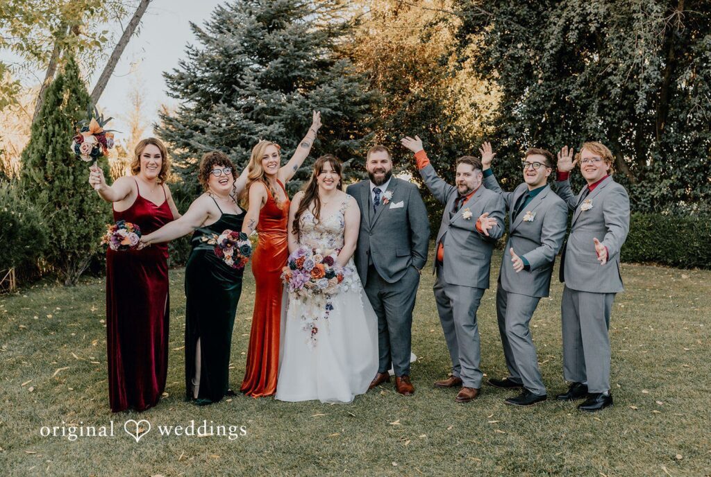 Phoenix Wedding Photographers capturing couple group photo with bridesmaids and groomsmen at Windmill House by Original Weddings