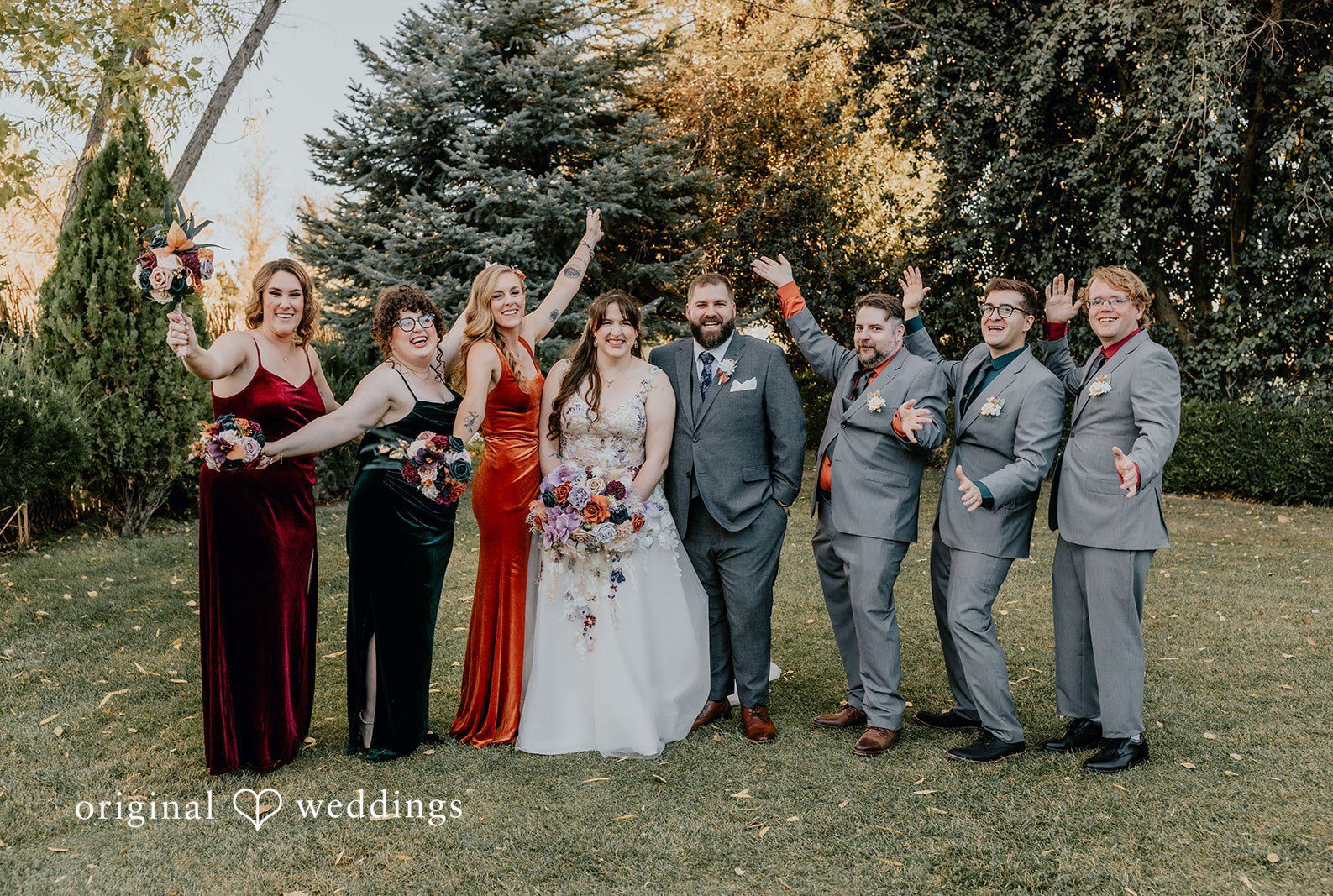 Phoenix Wedding Photographers capturing couple group photo with bridesmaids and groomsmen at Windmill House by Original Weddings
