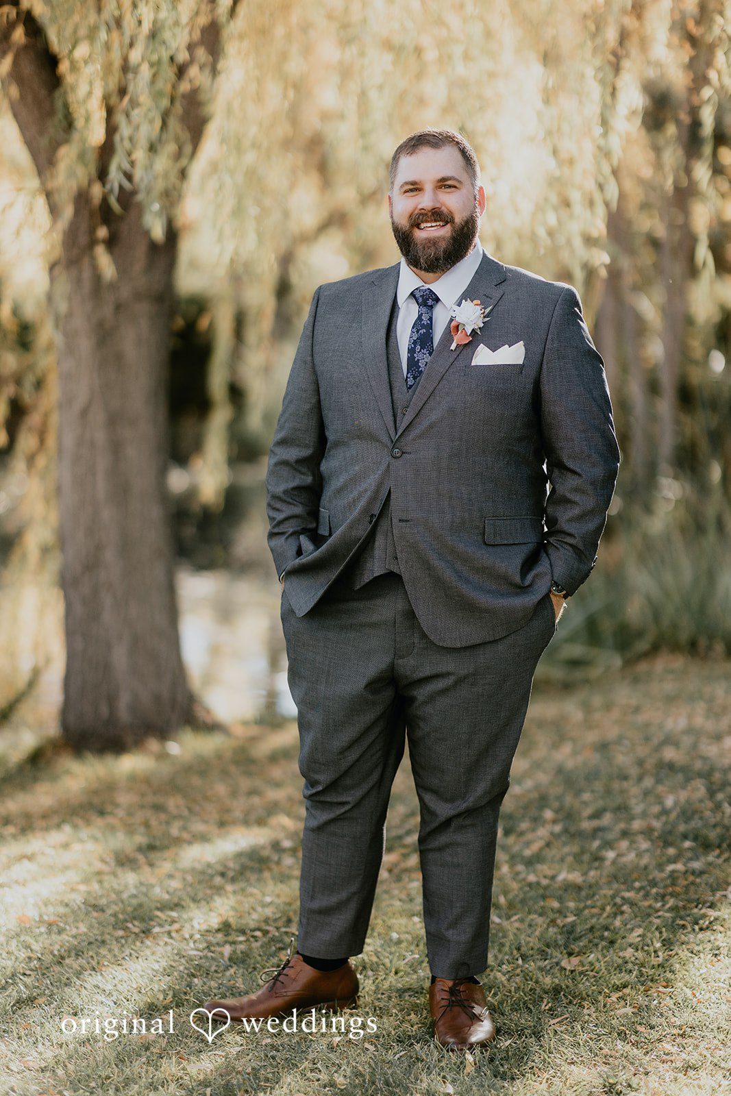 Stylish groom pose shot at Windmill House