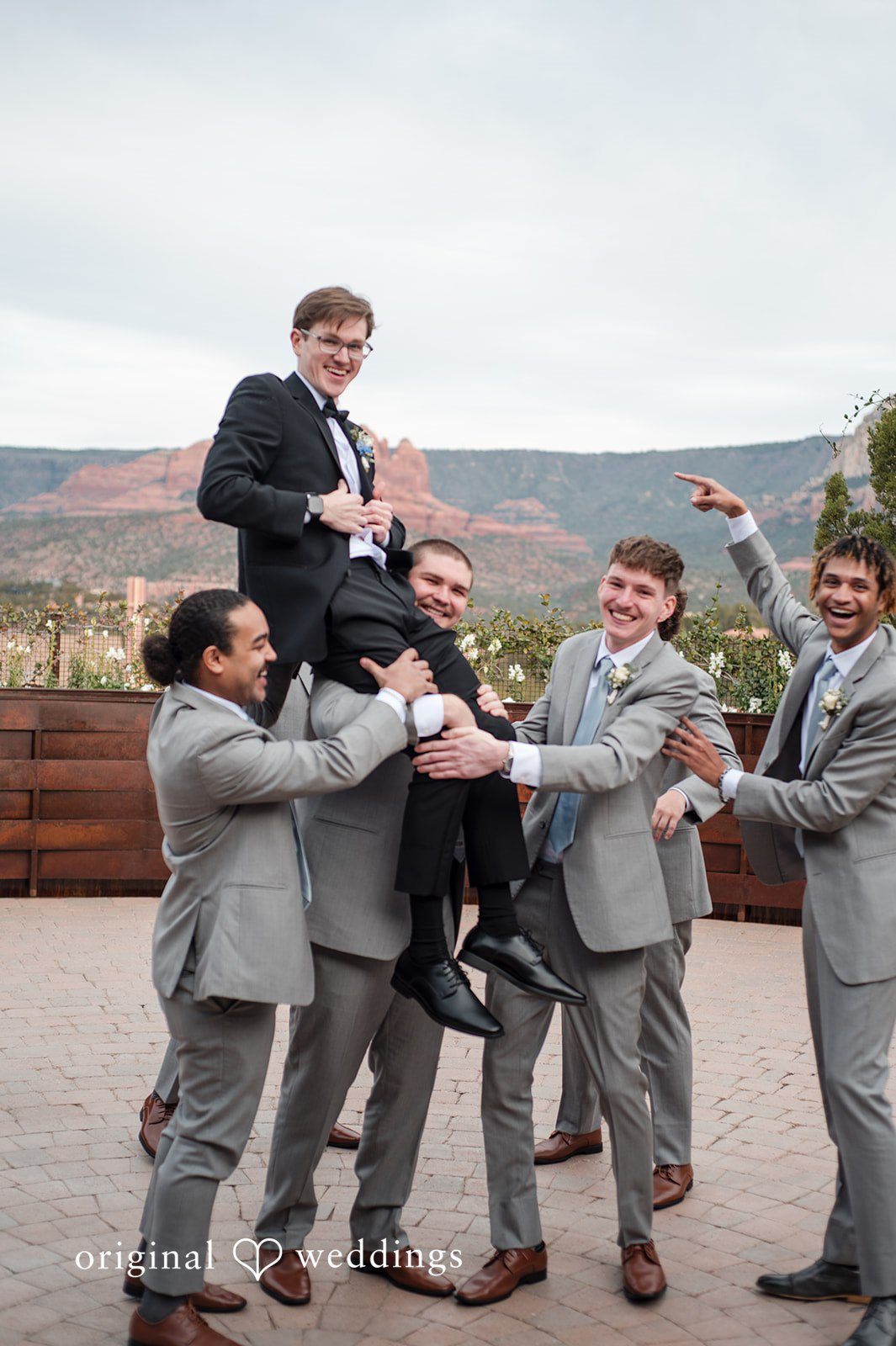 Stylish groom and groomsmen portrait on wedding day