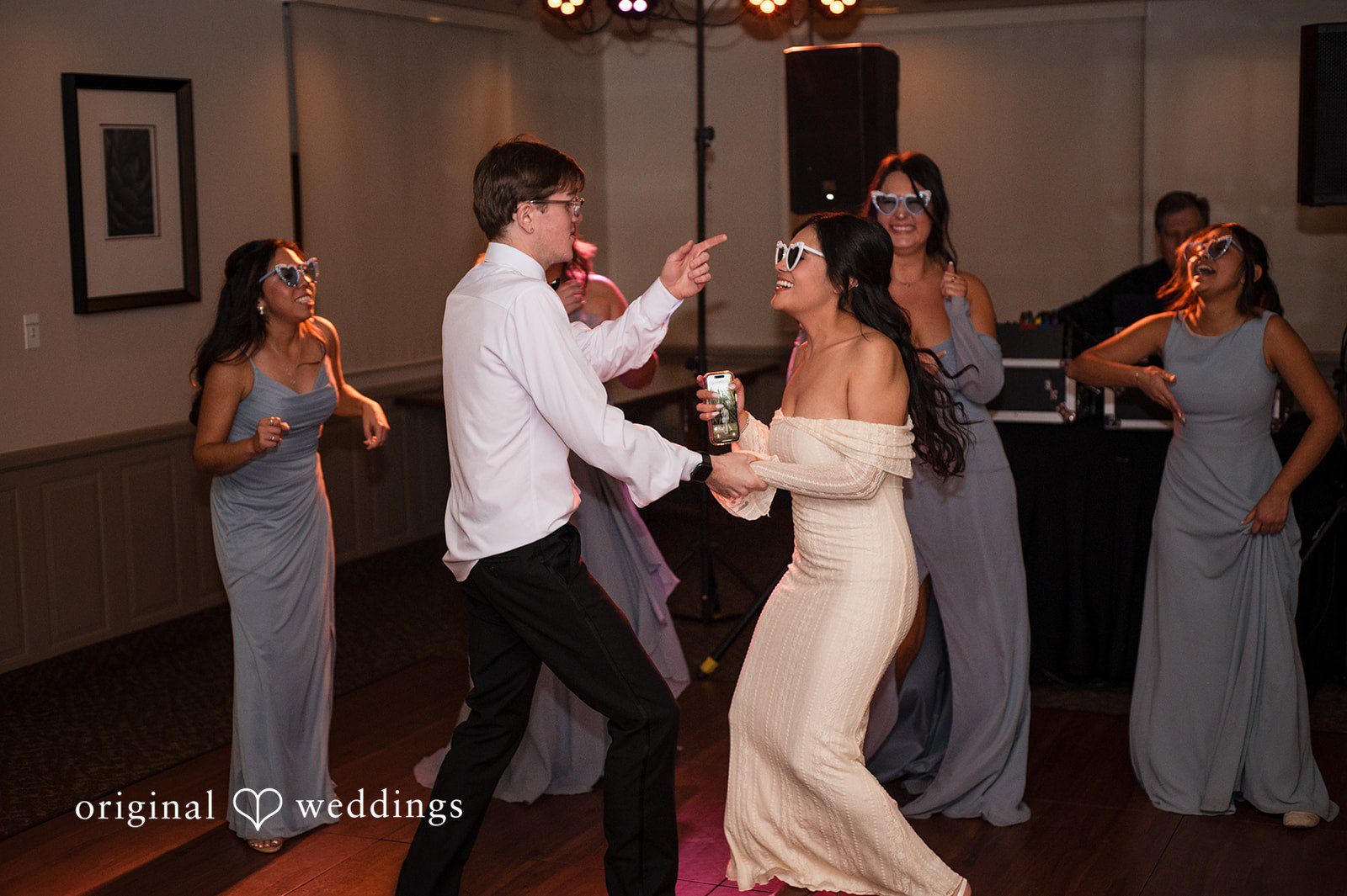 Phoenix Wedding Photographers capturing bride and groom dancing at Agave of Sedona by Original Weddings