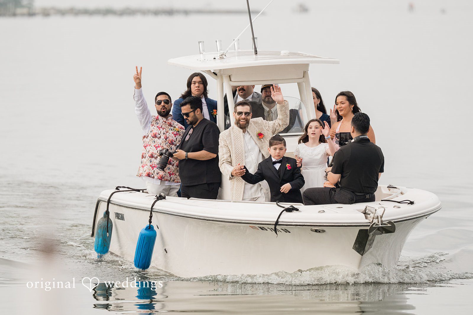 Lovely picture of groom with family and friends