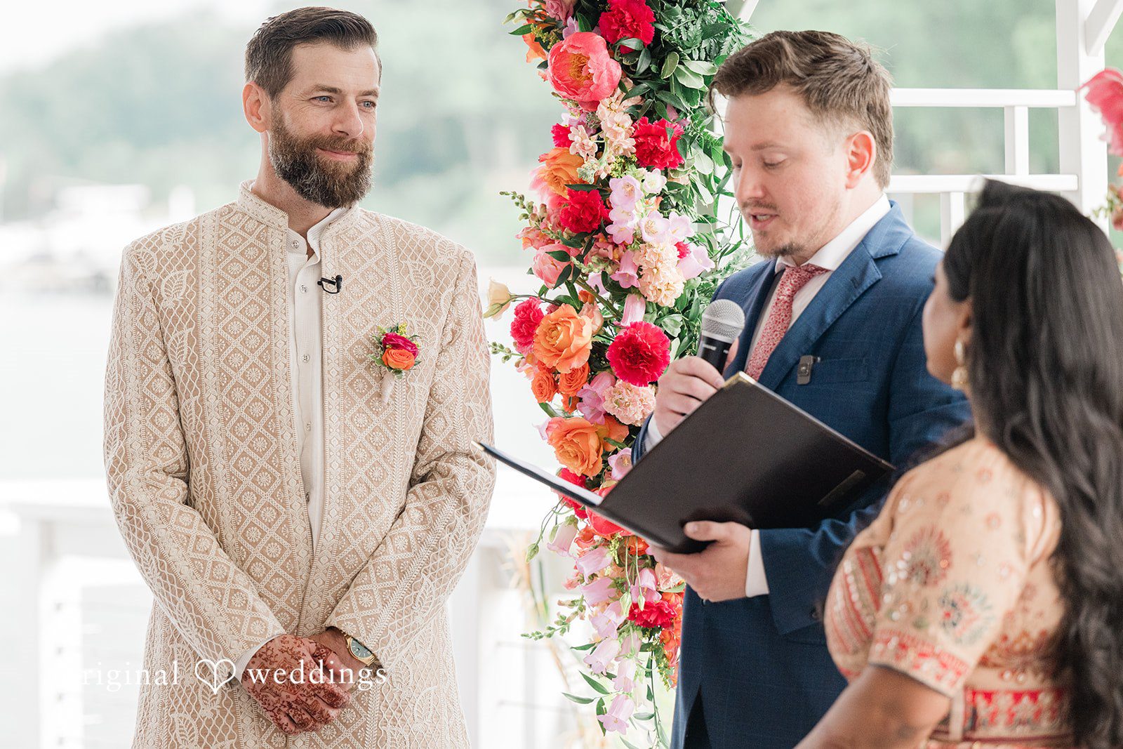 Groom looking at the bride with love during wedding ceremony at Anchor Inn