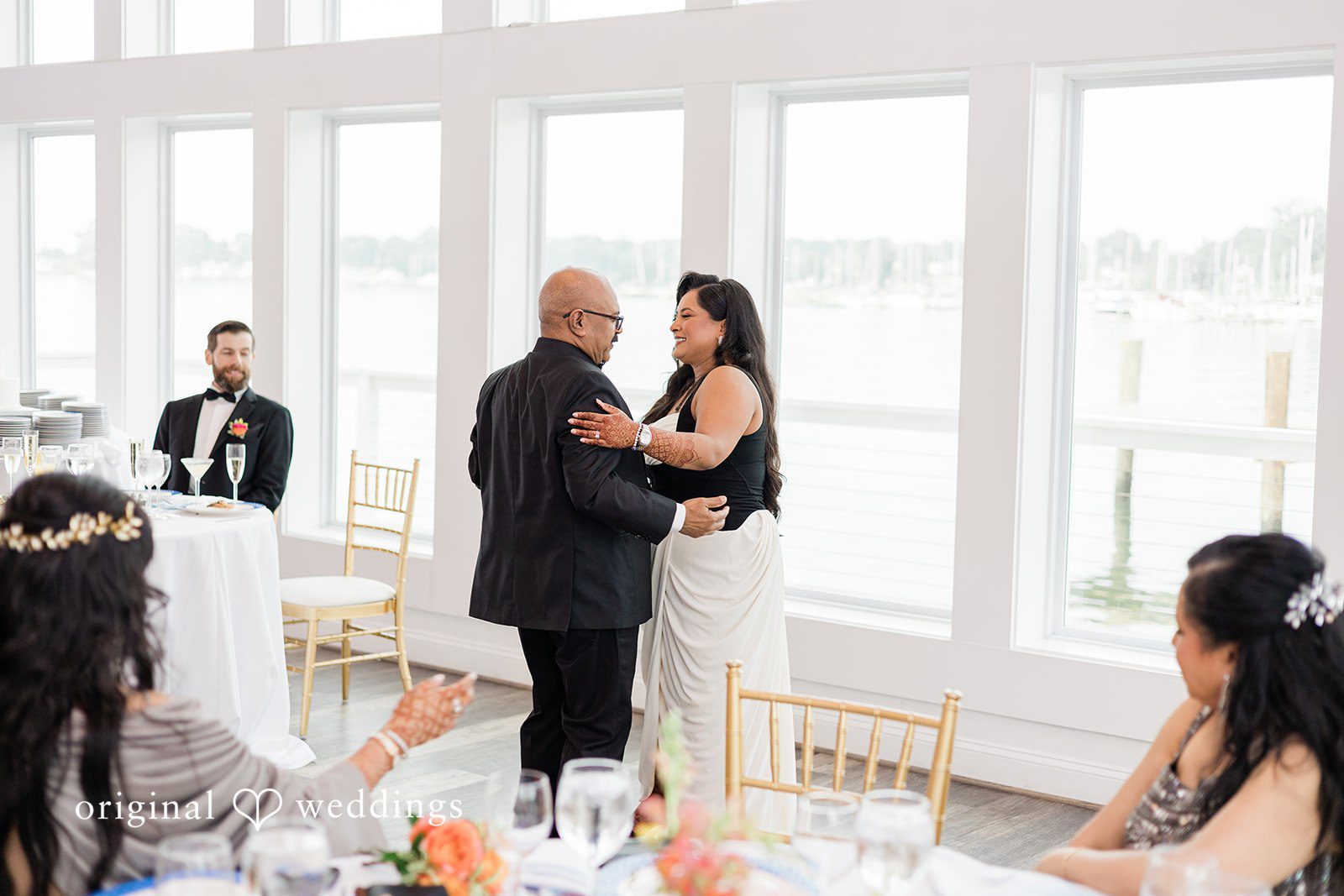 Bride sharing a dance with a man at Anchor Inn