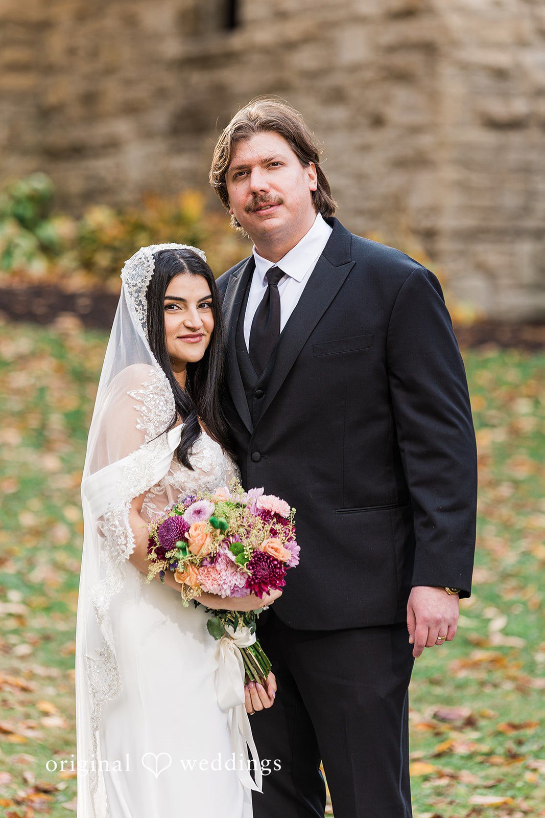 Zaina + Nick Cleveland Wedding Photographers capturing couple at Annunciation Greek Orthodox Church by Original Weddings