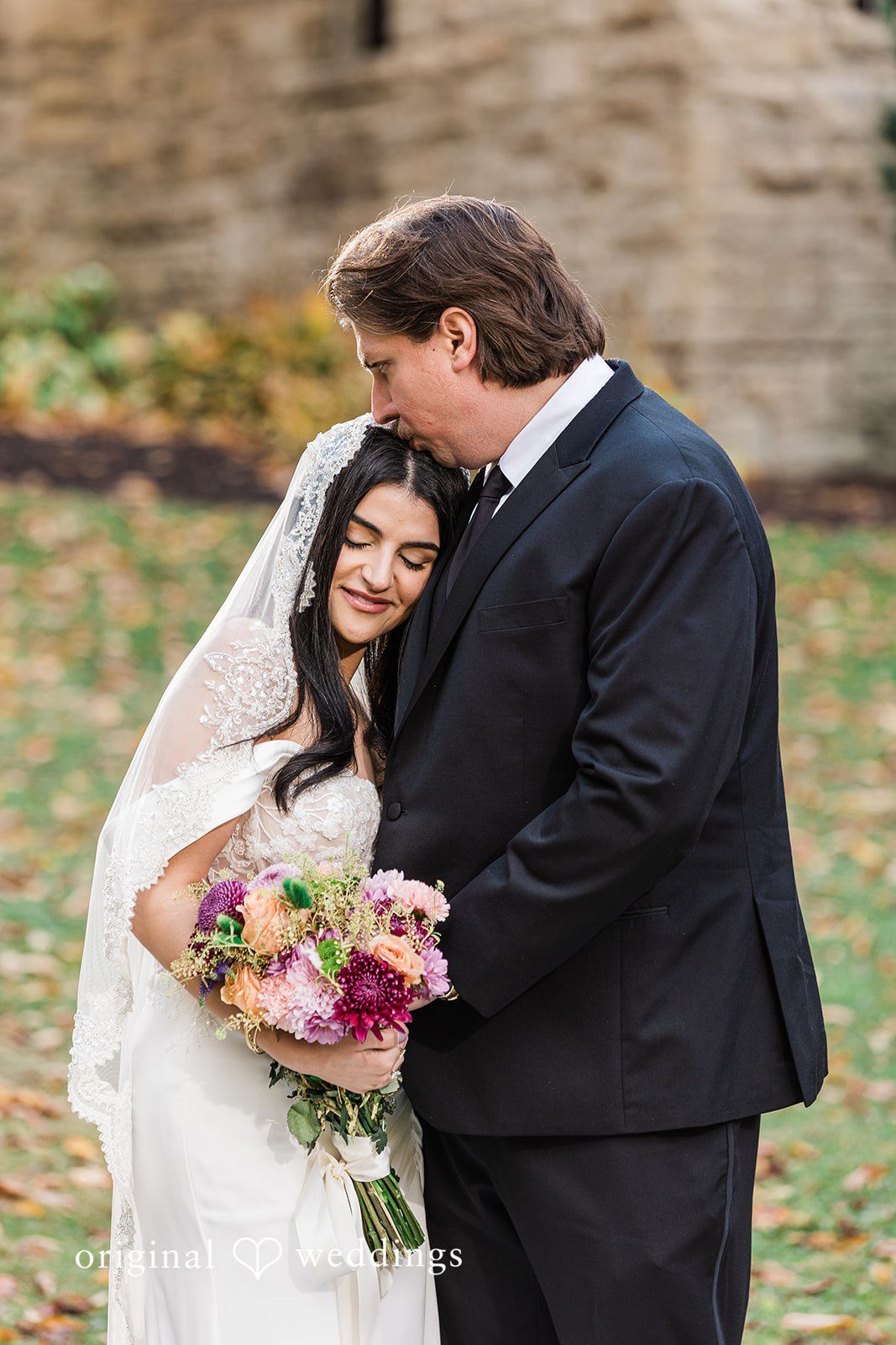 Zaina + Nick Romantic moment between couple at Annunciation Greek Orthodox Church