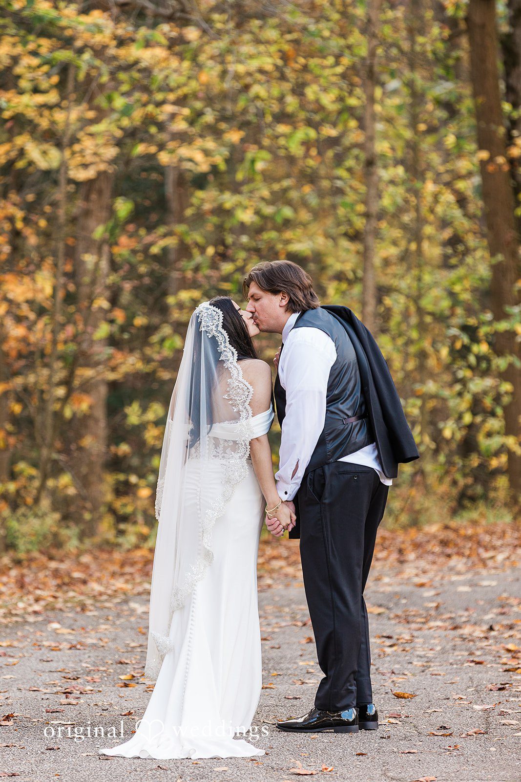 Zaina + Nick Romantic kiss between couple at Annunciation Greek Orthodox Church