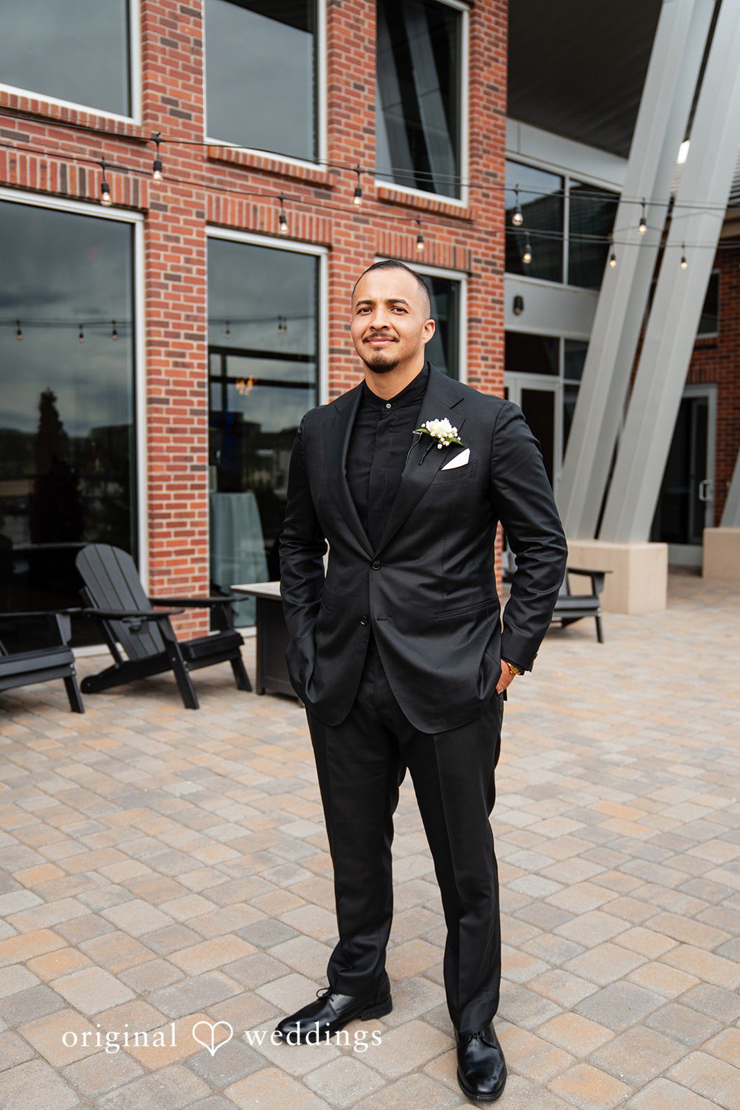 Emily + Miguel Our Denver wedding photographers captured a cute portrait of the groom