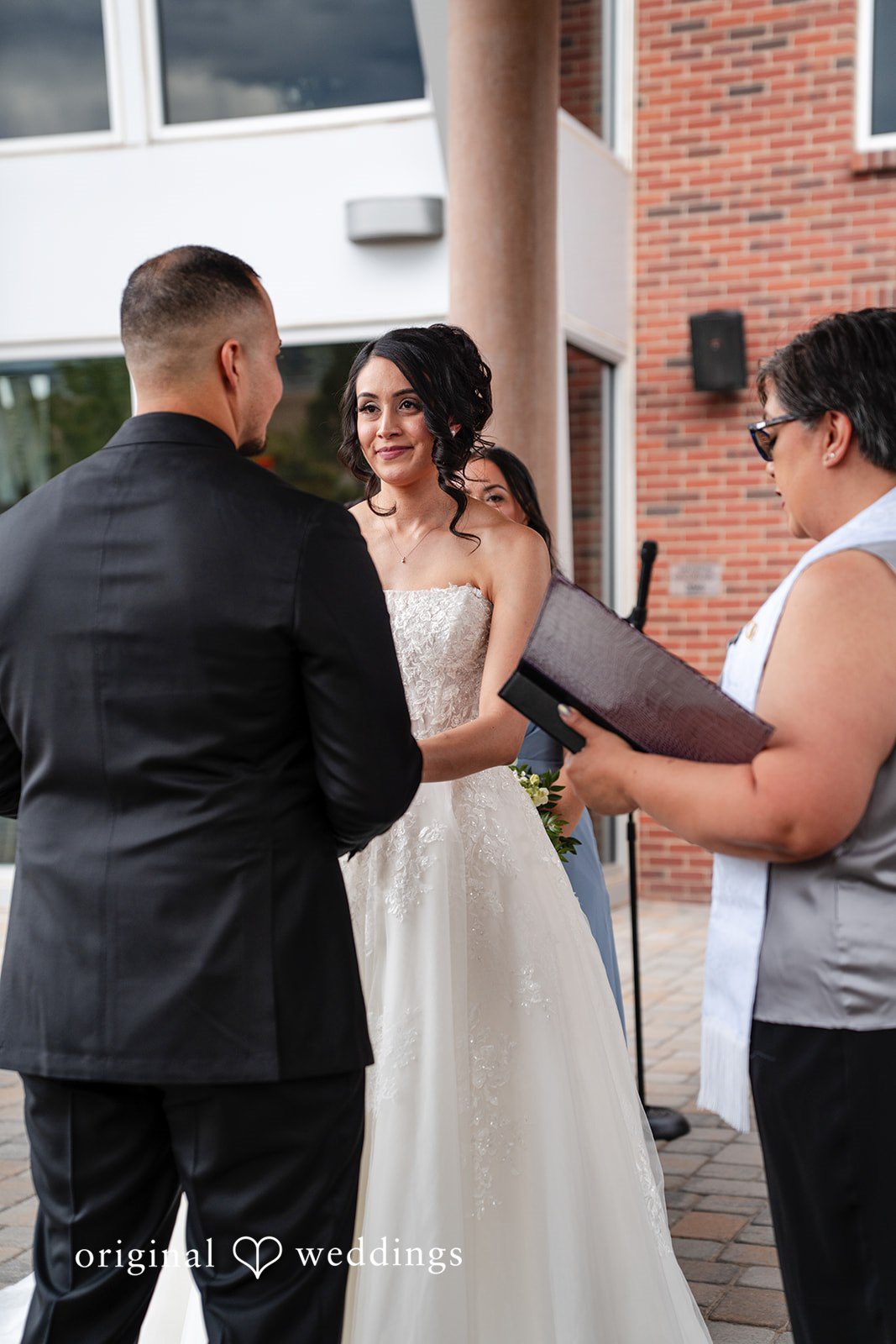 Emily + Miguel The couple exchanges wedding rings