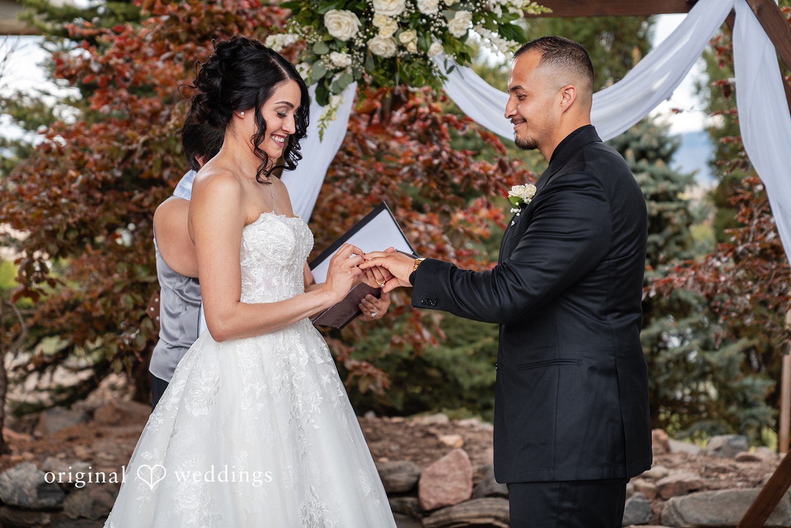 Emily + Miguel The couple exchanges rings