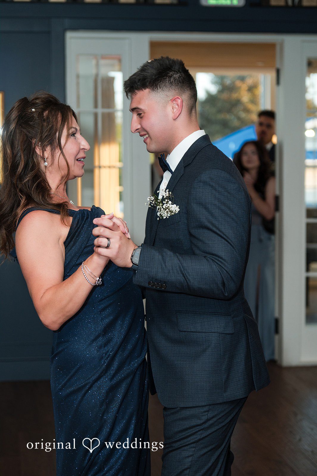 Andrew + Paige Groom dancing with his mother during the reception