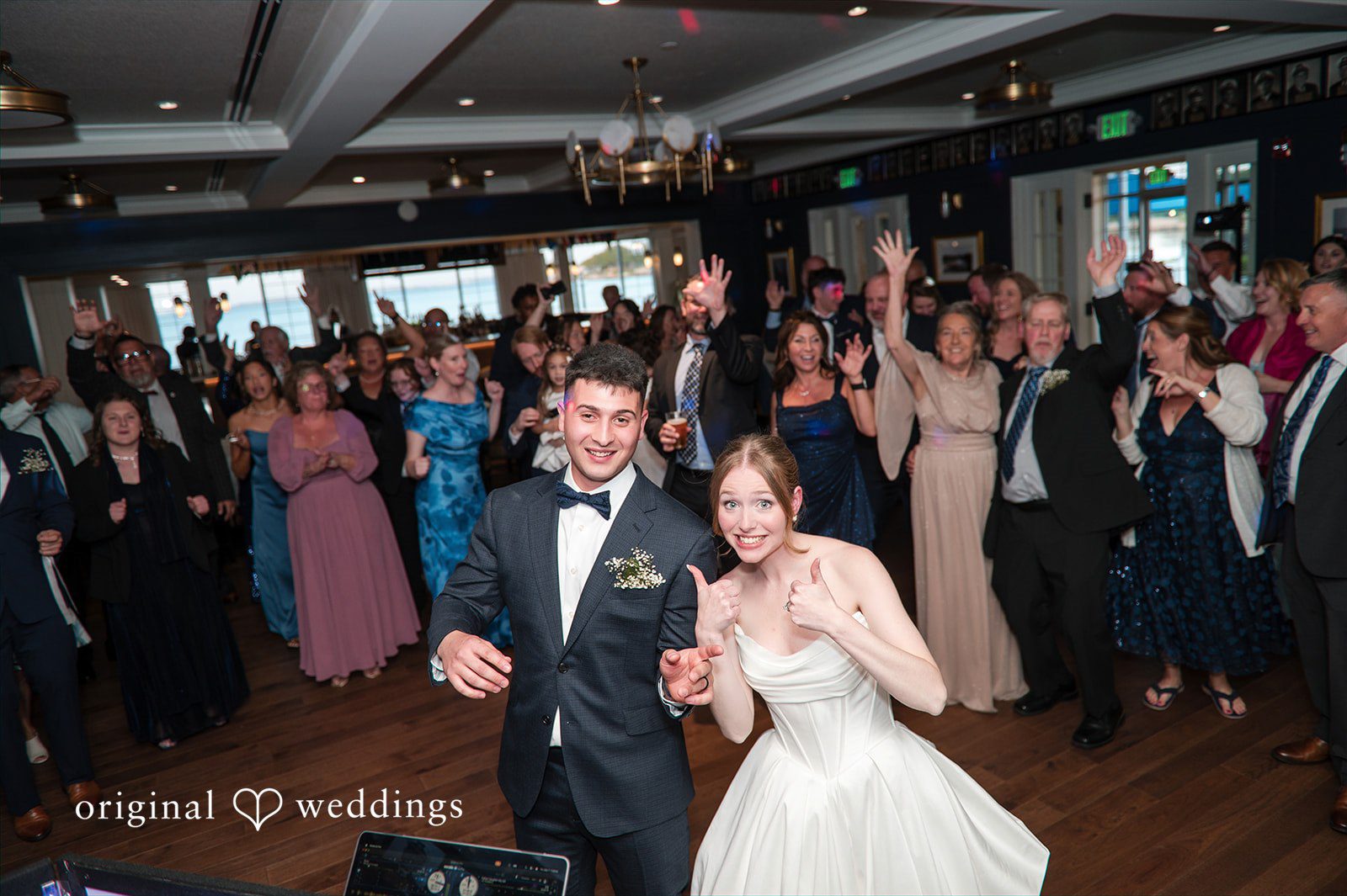 Andrew + Paige Bride and groom celebrating with guests on the dance floor