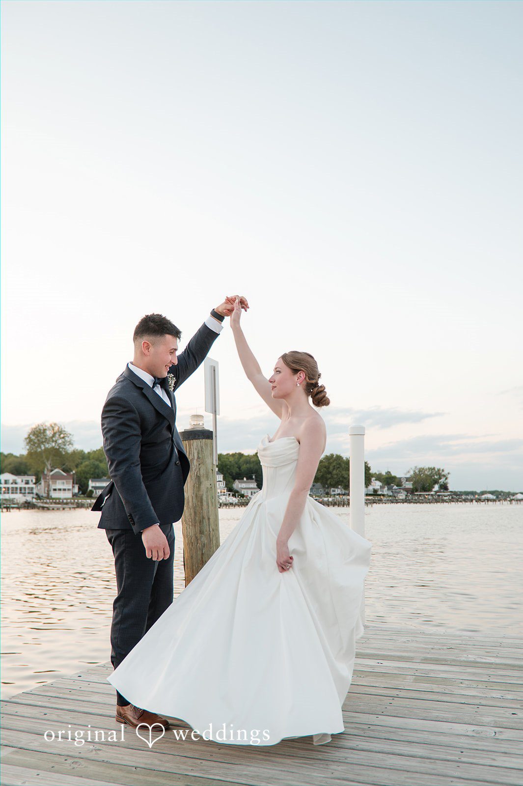 Andrew + Paige Bride and groom kissing beneath the veil during portraits