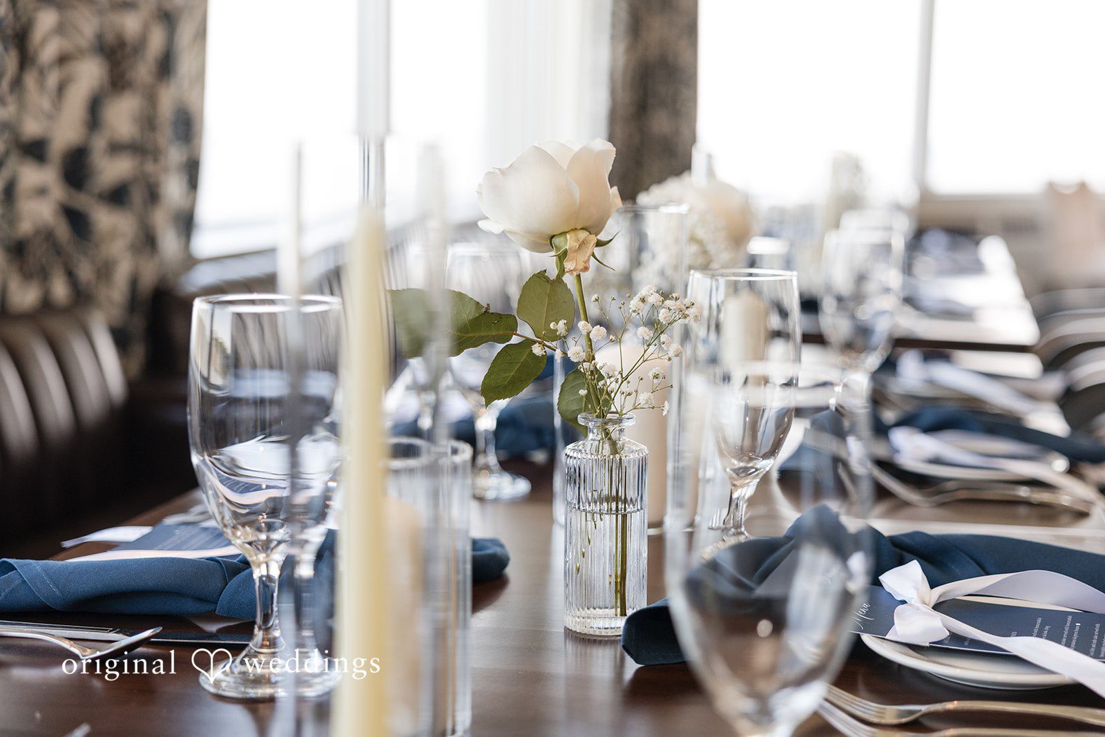 Andrew + Paige Close-up of reception table décor and wedding details