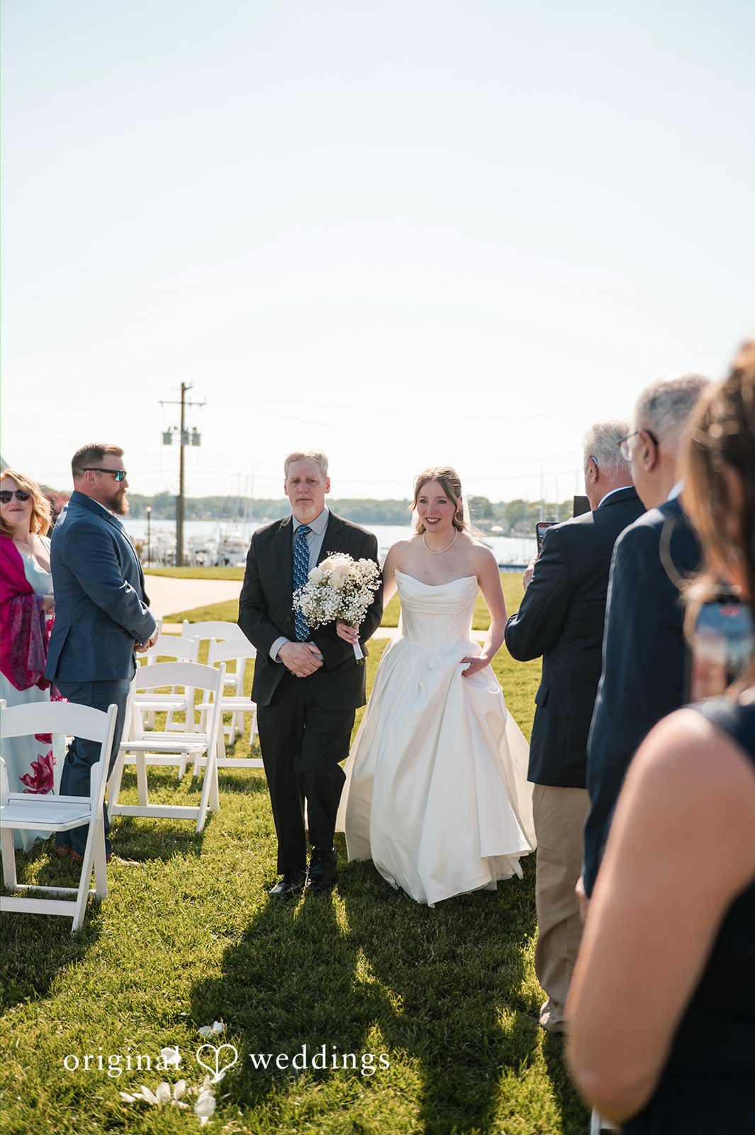 Andrew + Paige Bride walking down the aisle with her father