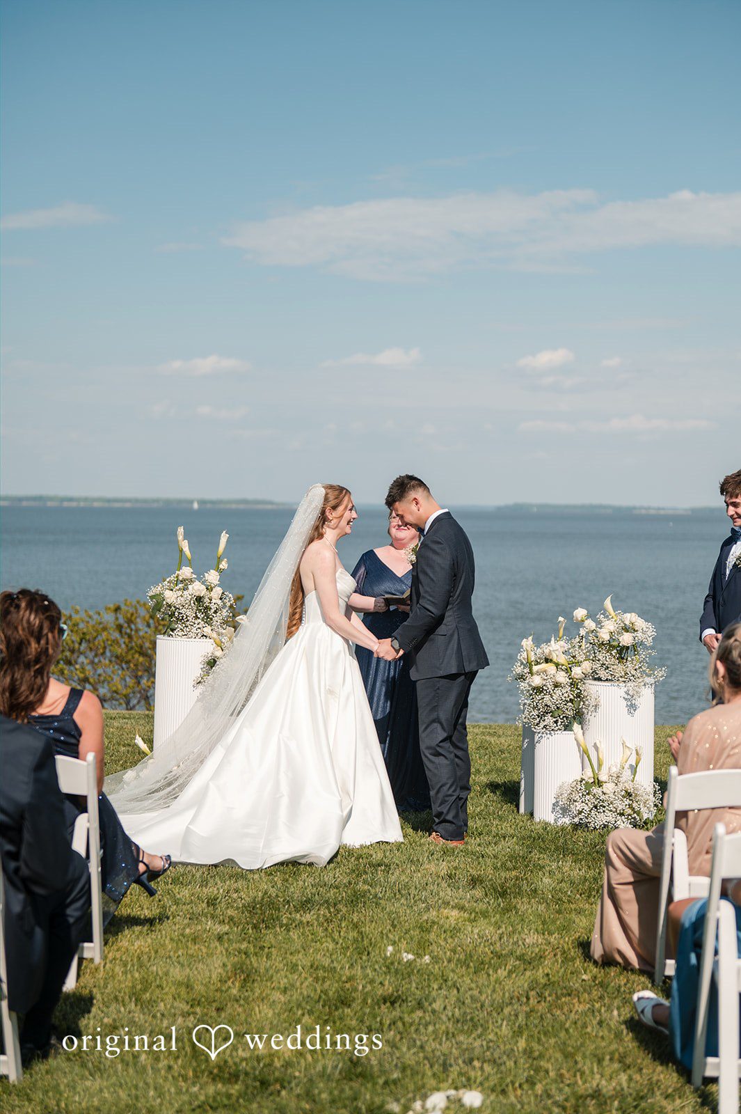 Andrew + Paige Bride and groom exchanging vows during the ceremony