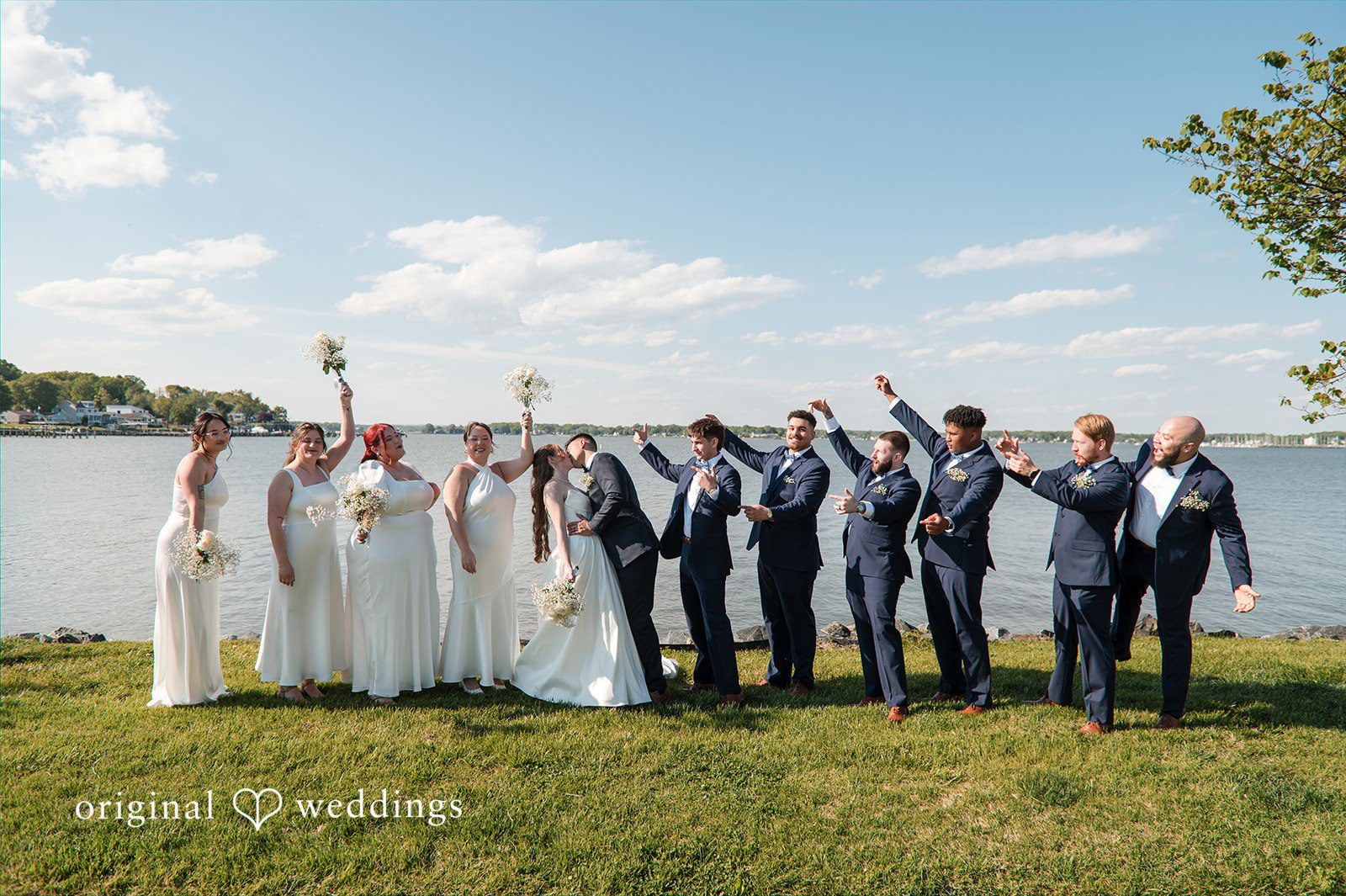 Andrew + Paige Bride and groom with bridesmaids and groomsmen during wedding portraits