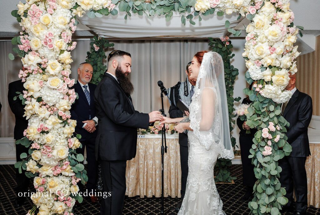 New York wedding photography by Original Weddings, capturing the couple at Bay Ridge Manor