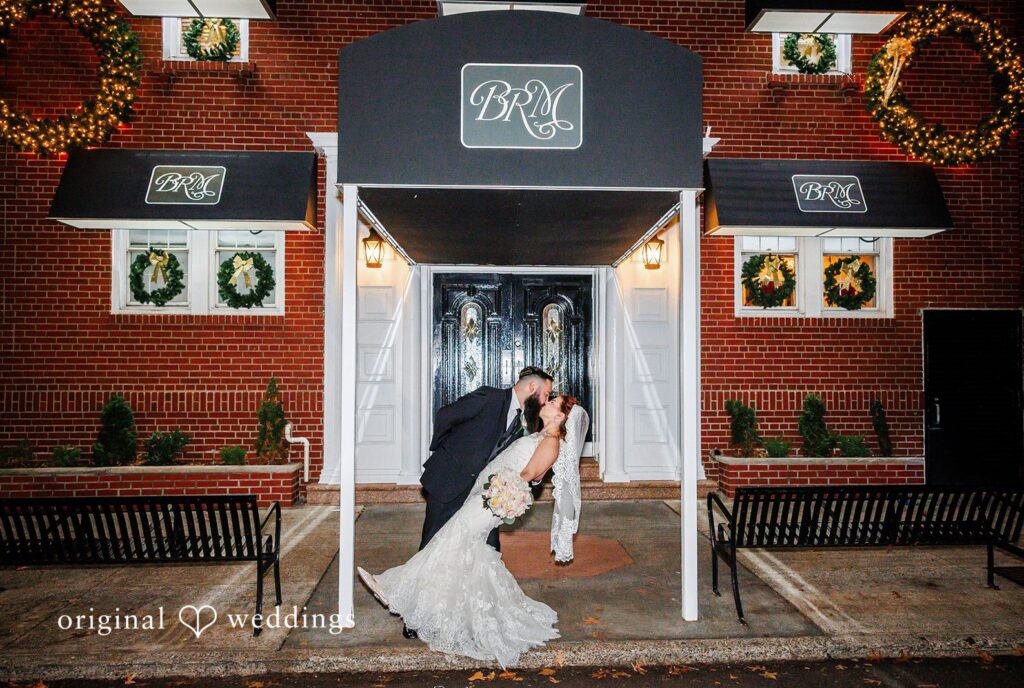 New York wedding photography by Original Weddings capturing couple kissing at Bay Ridge Manor