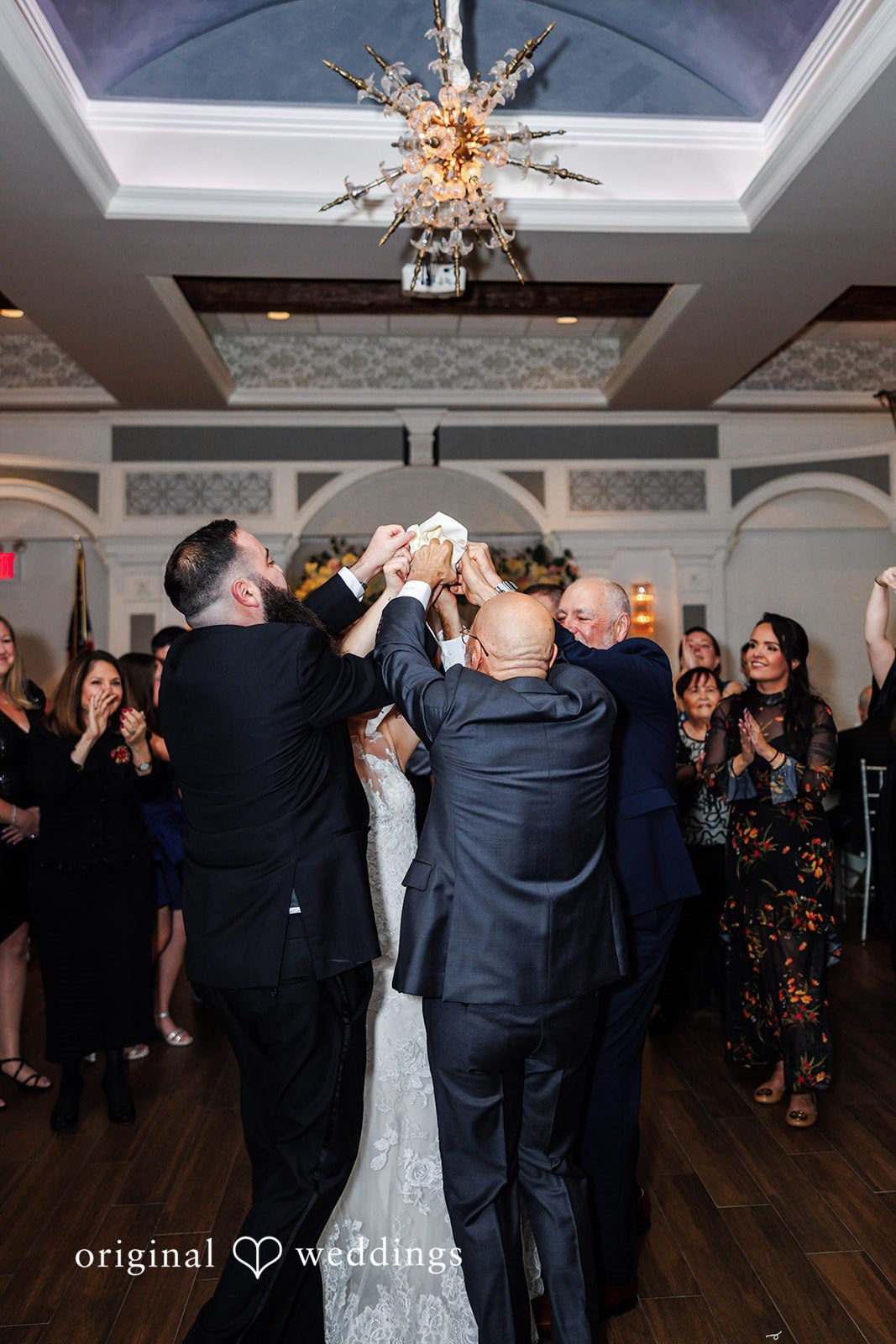 Beautiful group wedding moment at Bay Ridge Manor