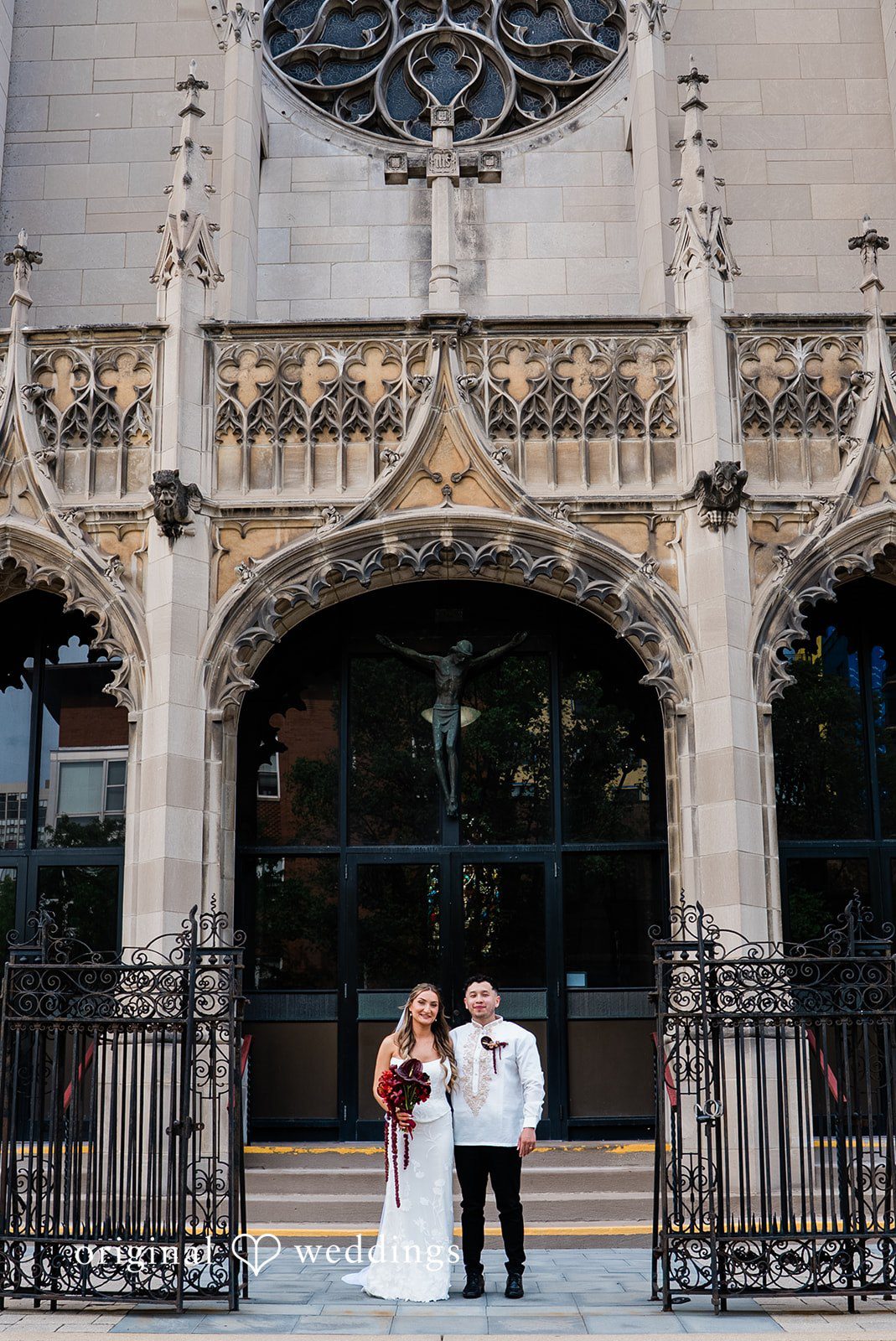 Michael + Maria Bride and groom posing outside the venue