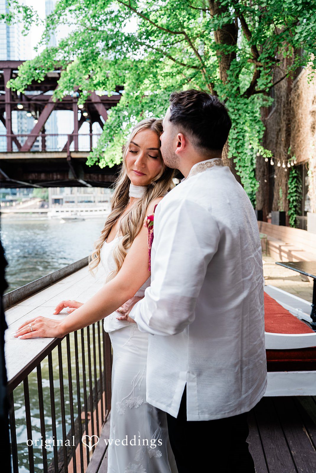 Michael + Maria Bride and groom sharing a quiet riverside moment at Beatnik on the River after their wedding ceremony.