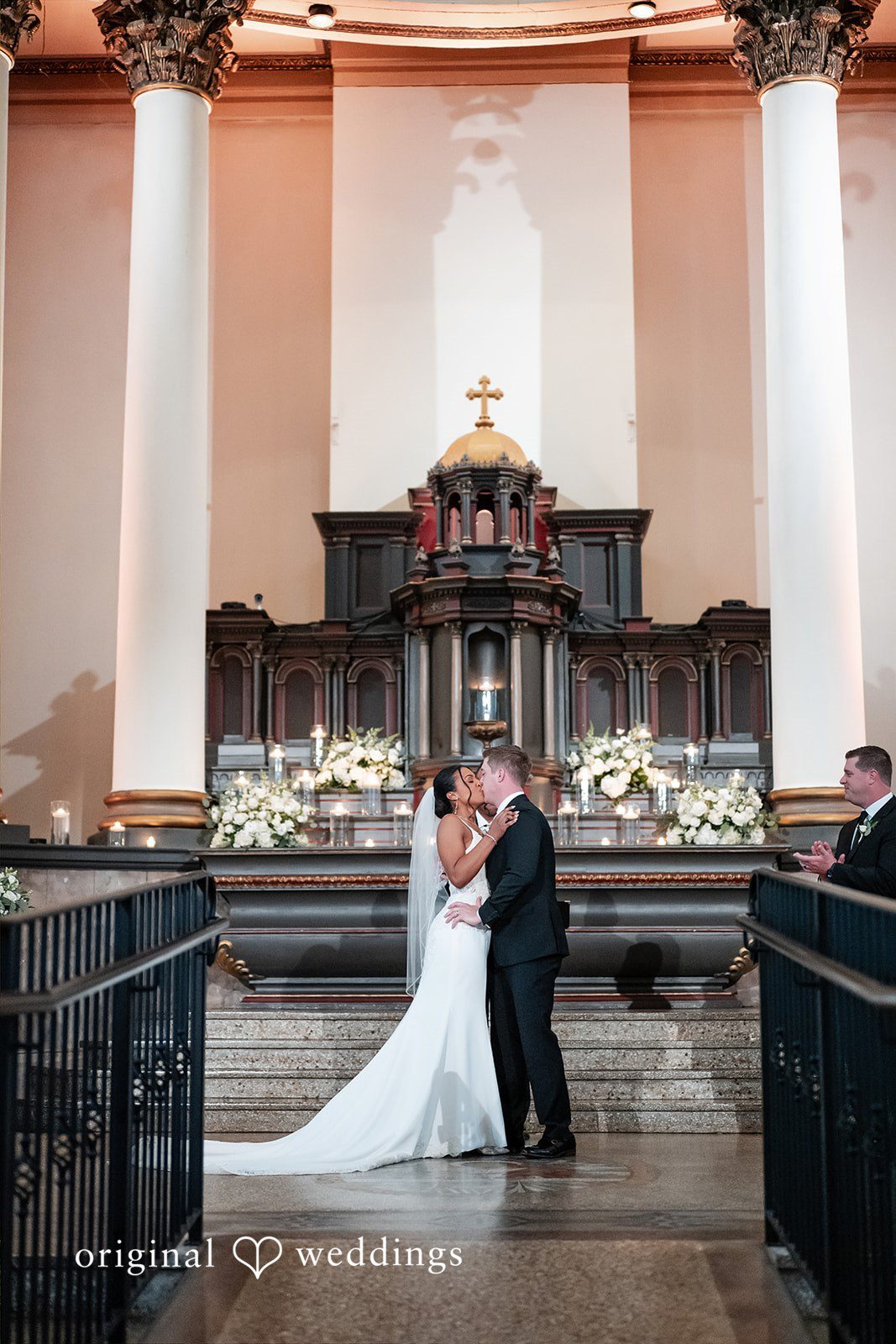 Sydney + Ty Bride and groom sharing their first kiss after the ceremony