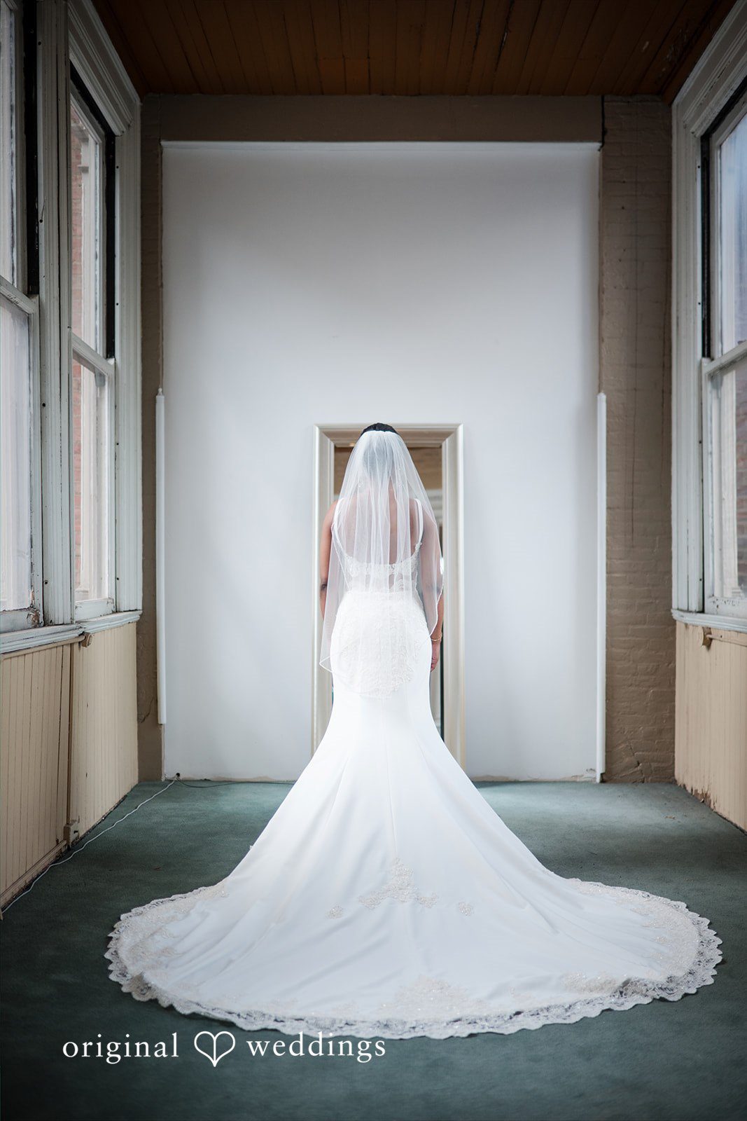 Sydney + Ty Back view of the bride after getting ready