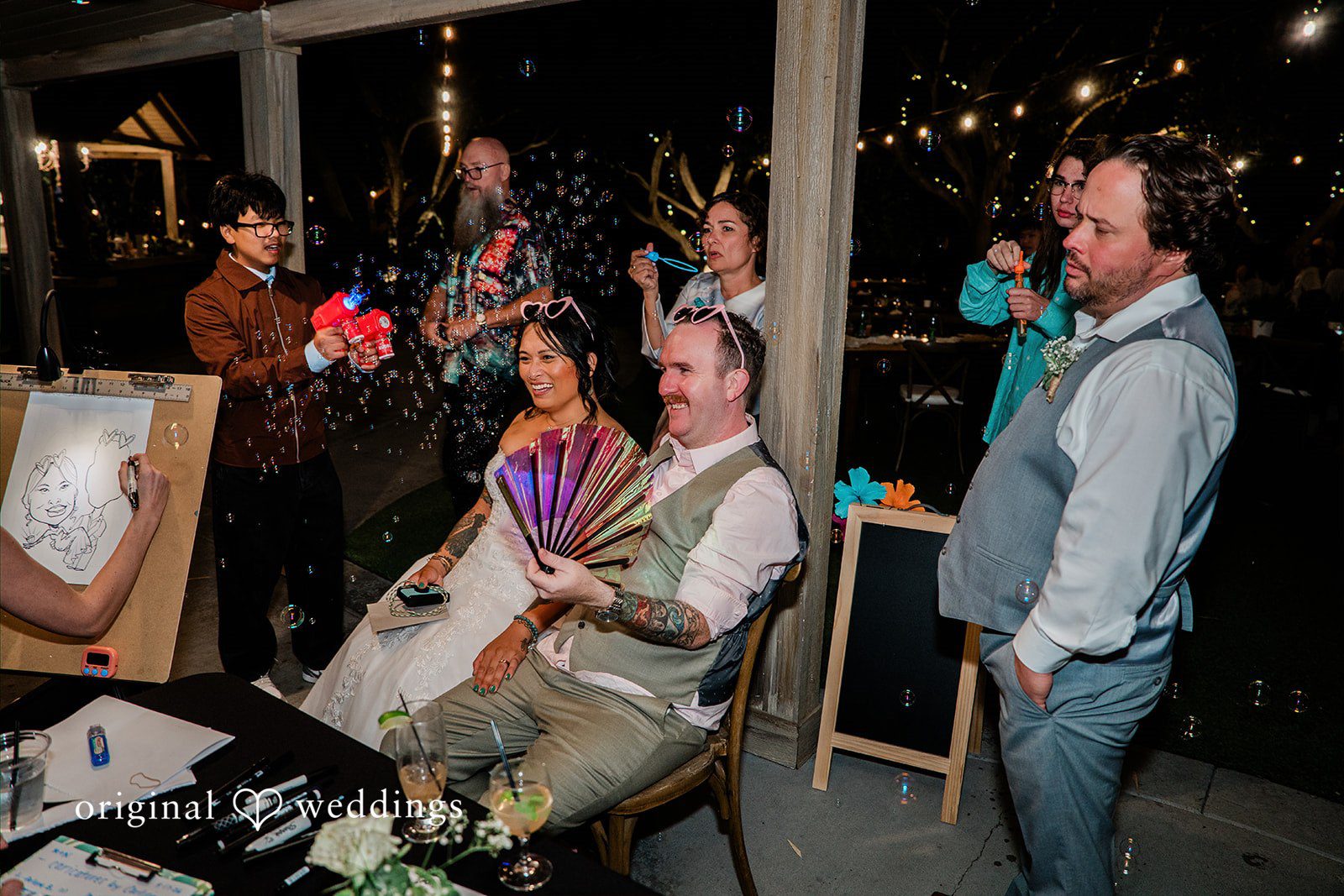 Mae + Nicholas Guests enjoy live wedding entertainment and playful moments during the evening reception