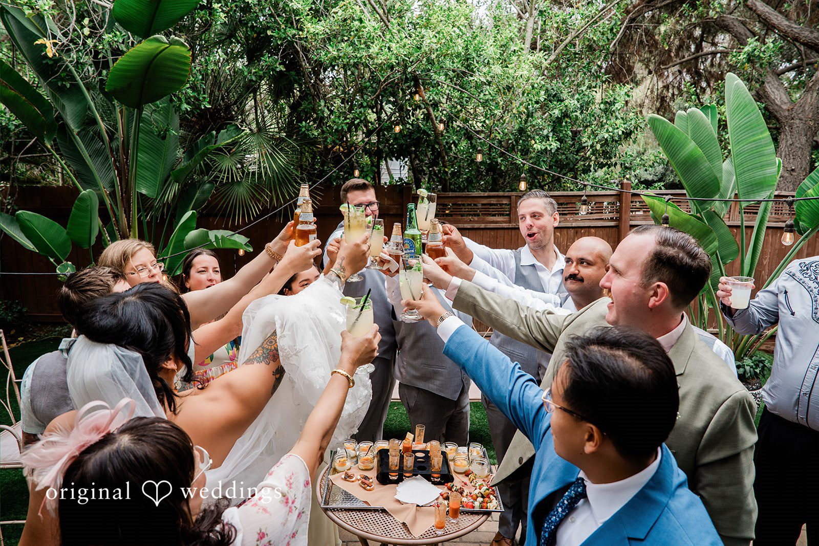 Mae + Nicholas Friends and family raise a celebratory toast with the couple