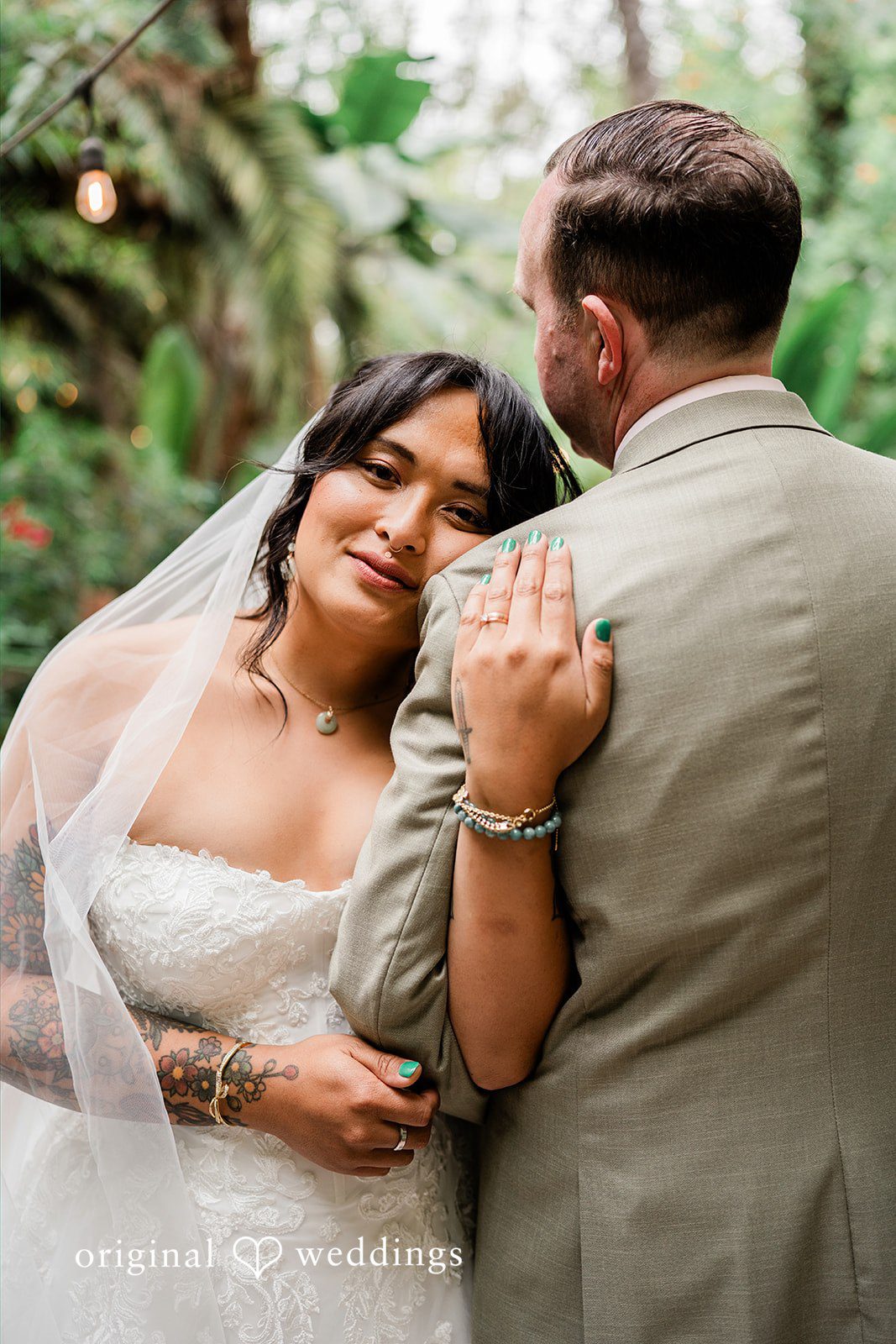 Mae + Nicholas Bride shares a quiet embrace with her groom