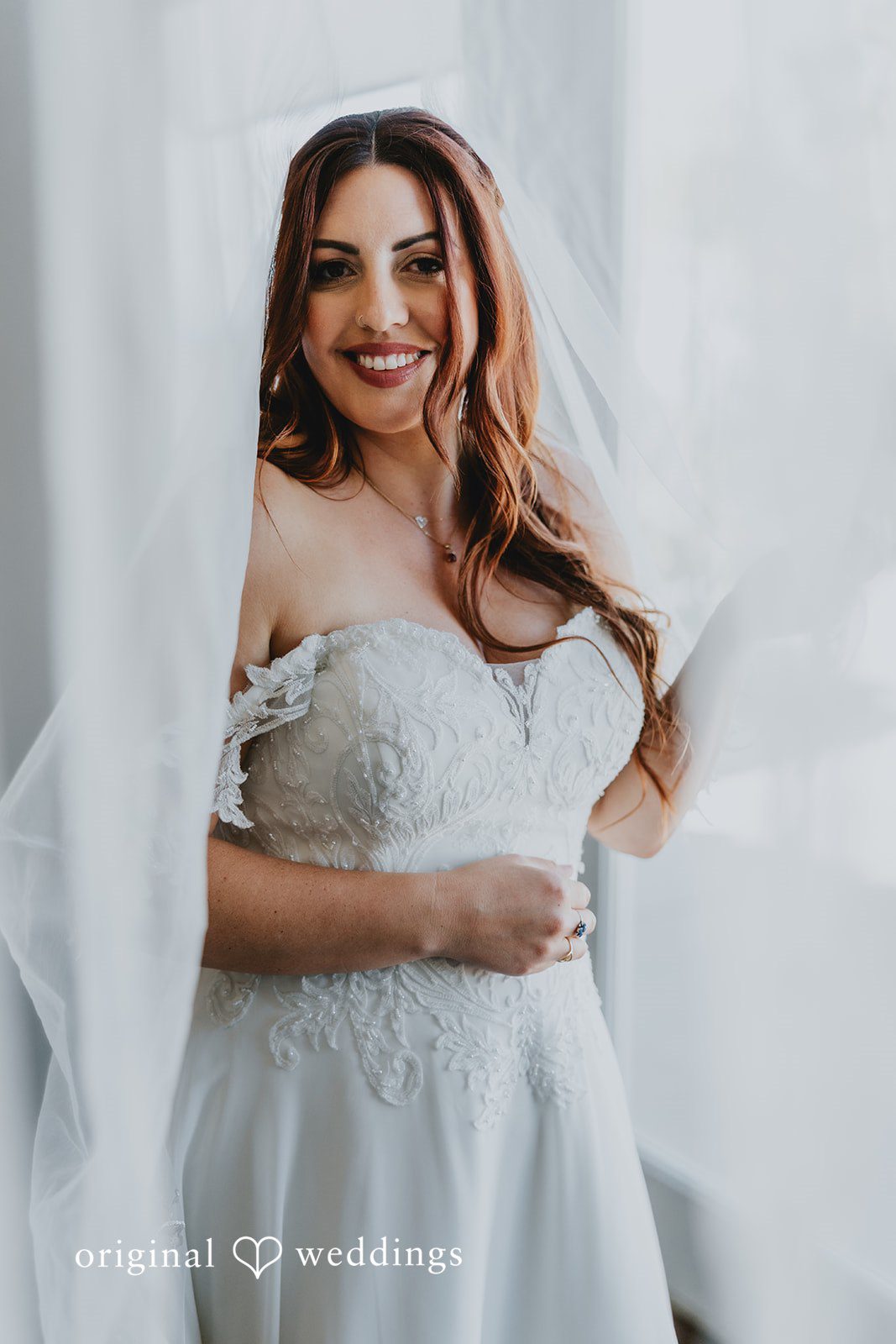 Lovely solo shot of bride in her wedding gown