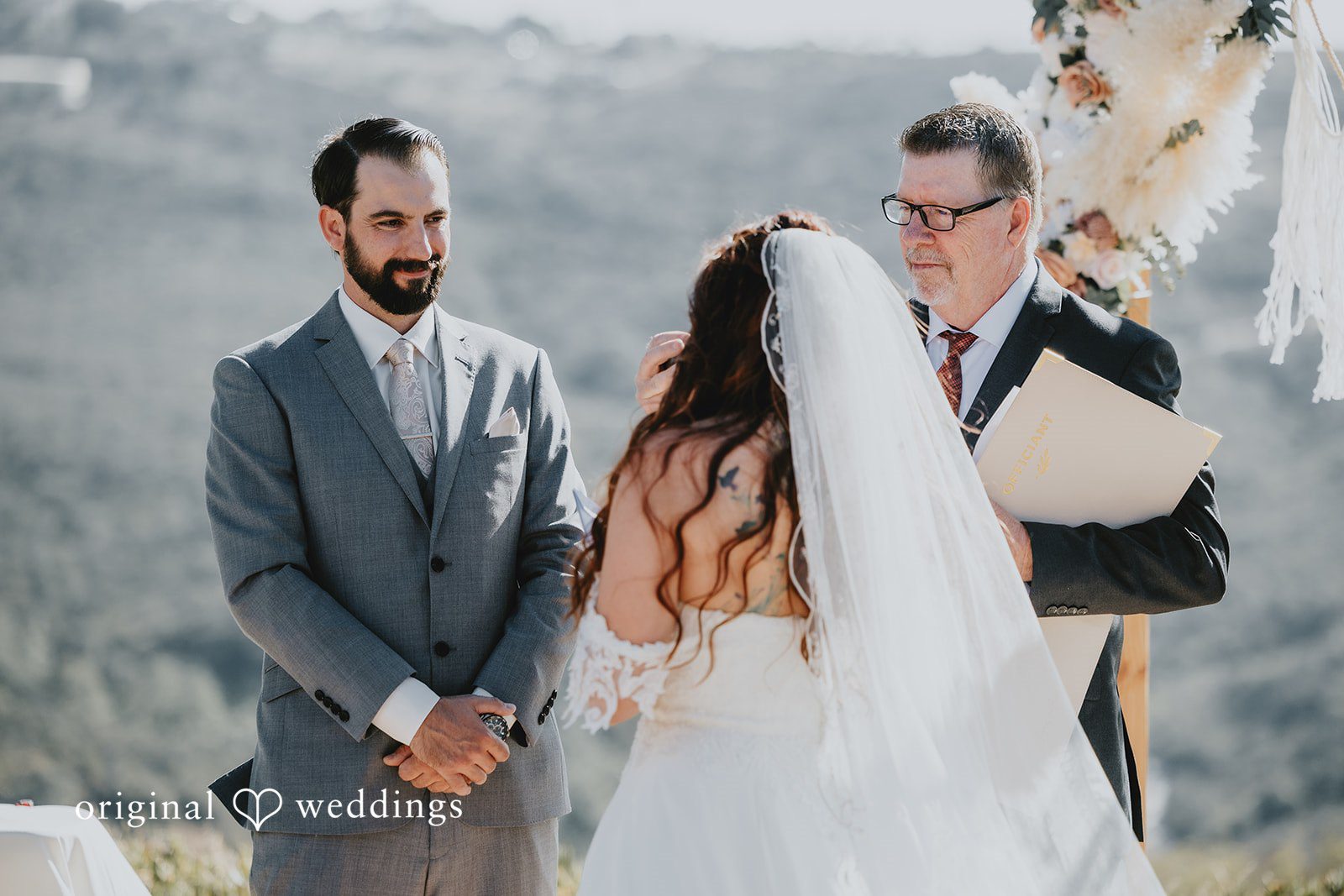 Groom looking at the bride with pure love