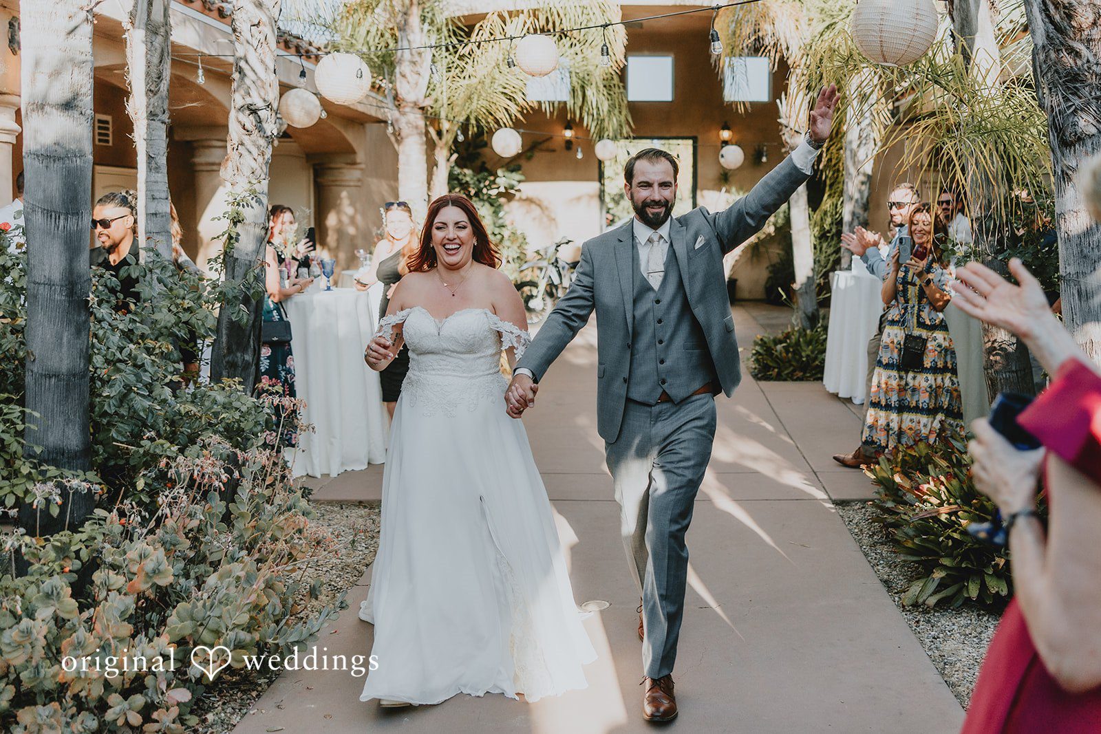 Couple expressing their happiness while walking and holding hands